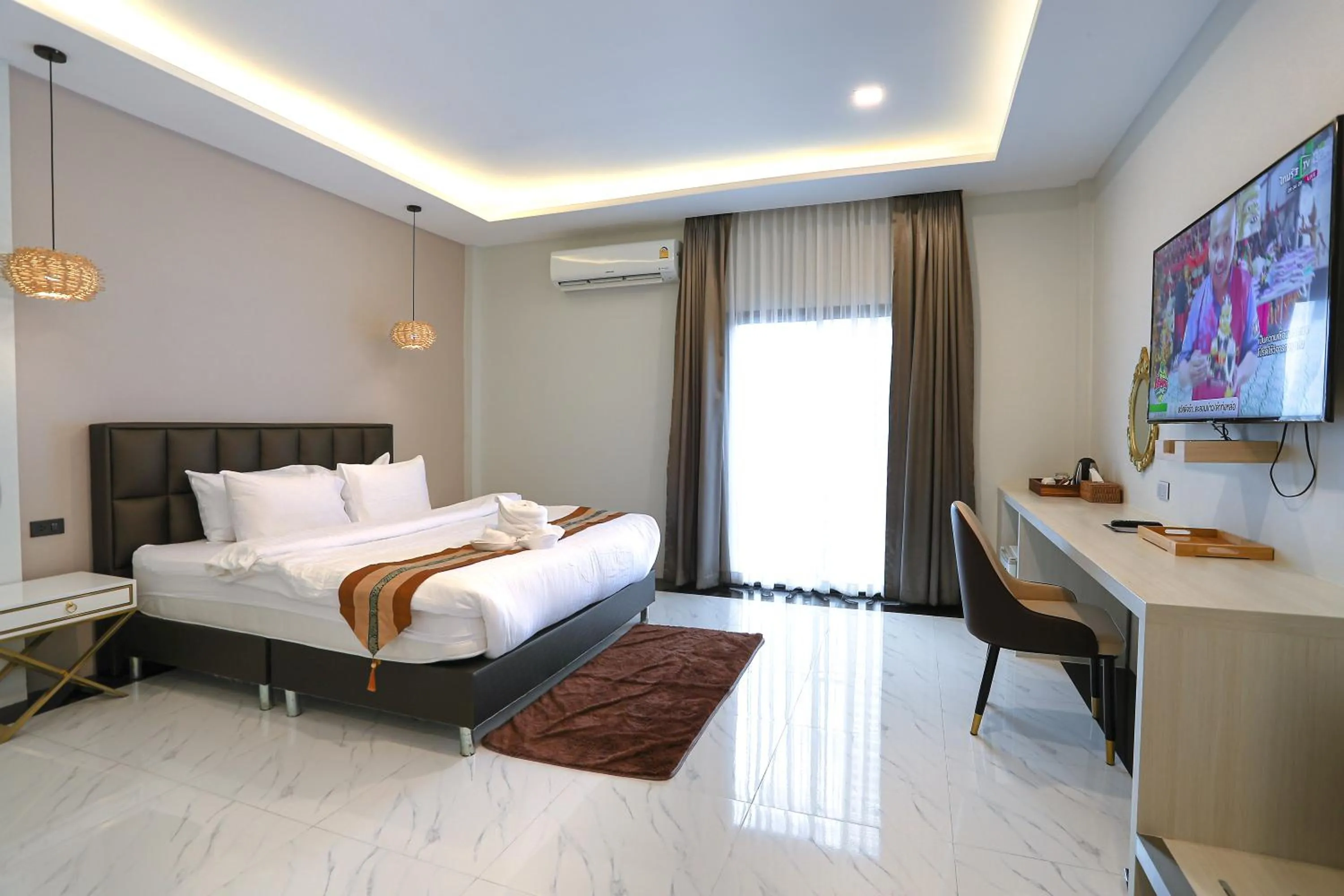 Bed in Worachat Boutique Hotel