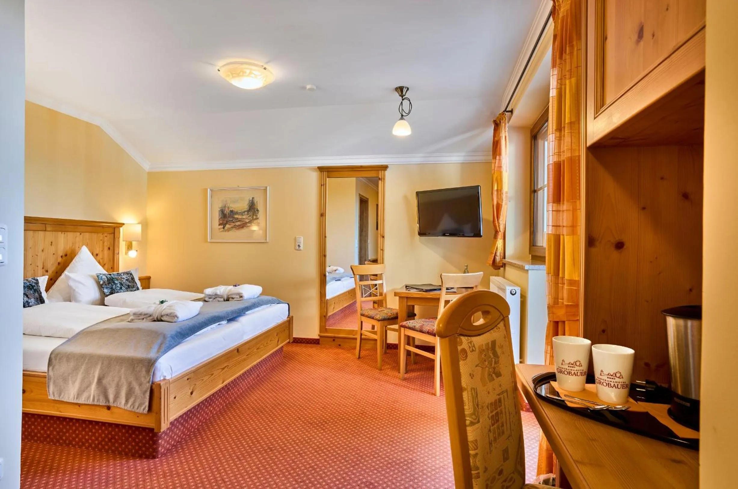 Bed in Panoramahotel Grobauer