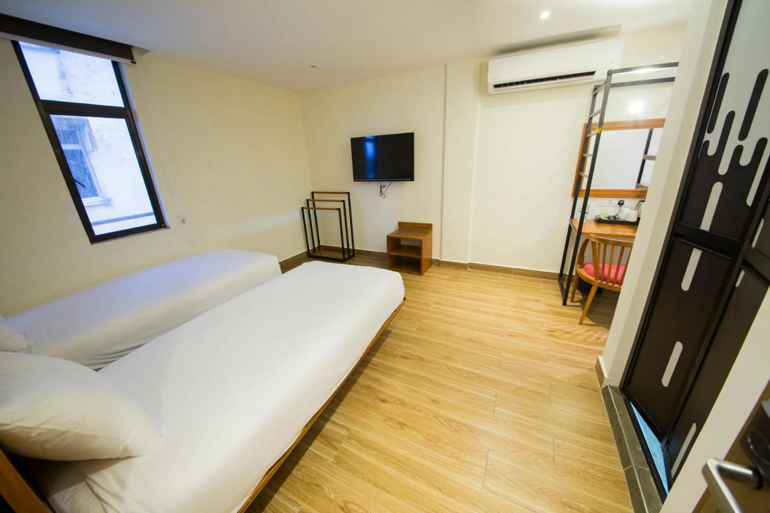 Photo of the whole room, Bed in The Point Boutique Hotel