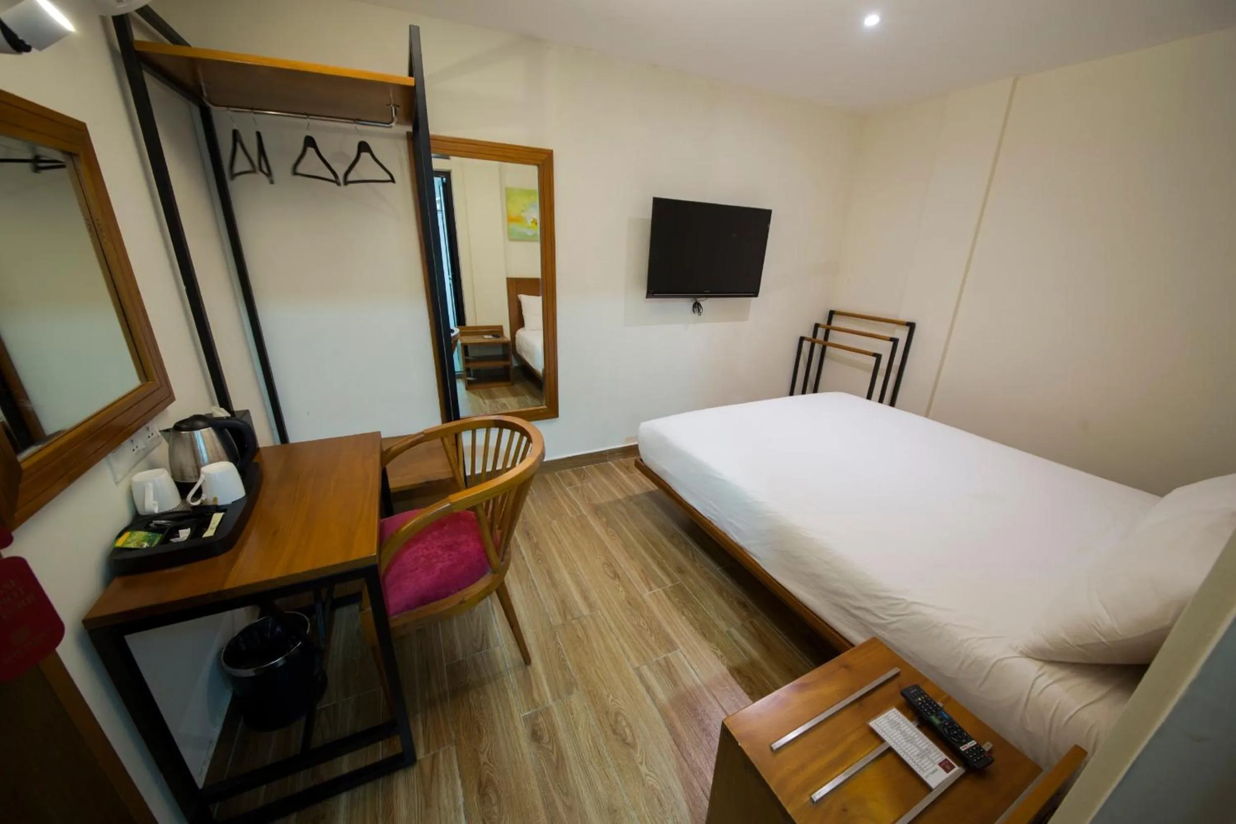 Photo of the whole room, Bed in The Point Boutique Hotel