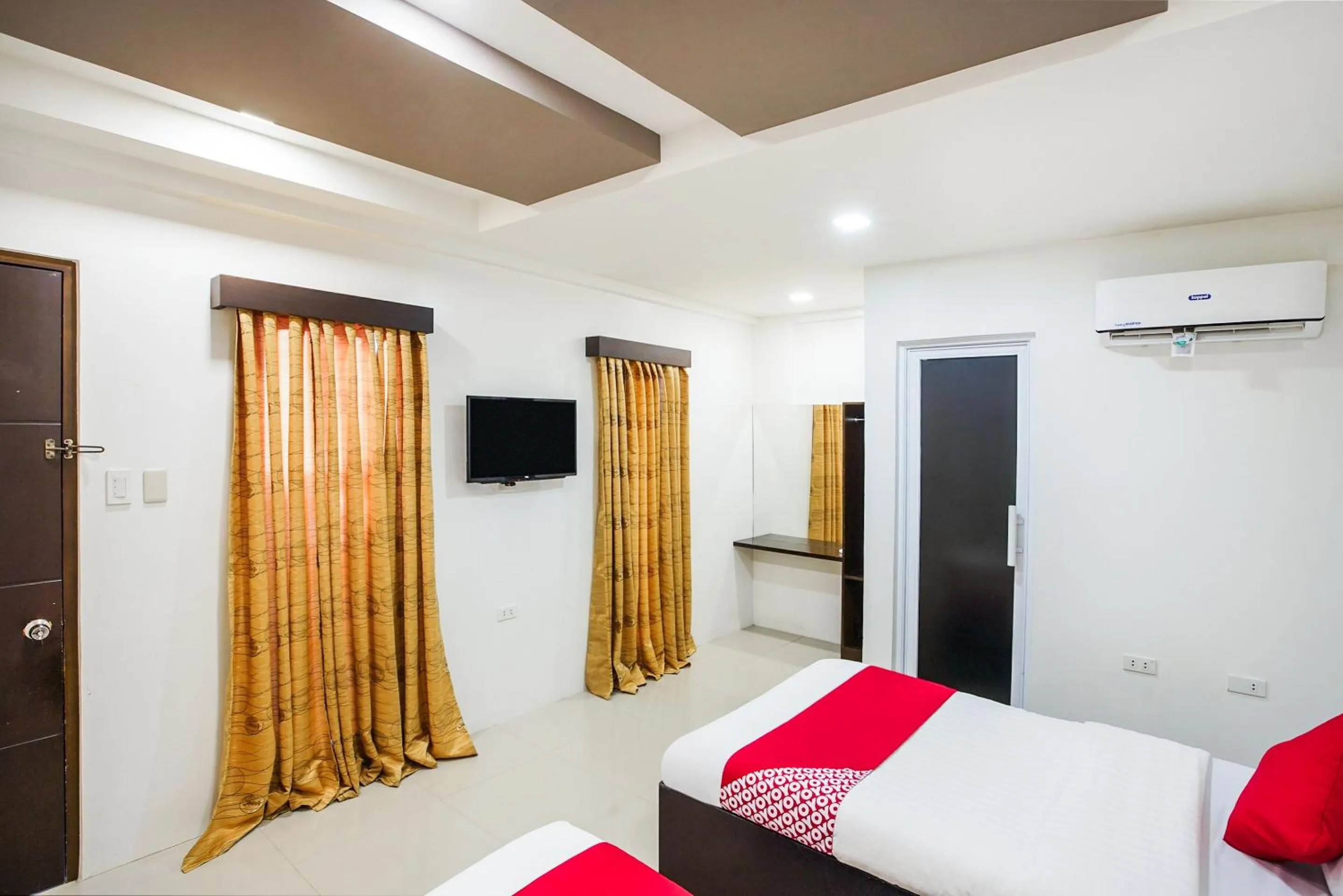 Bedroom, Bed in OYO 489 Casa Mia Hotel Suites