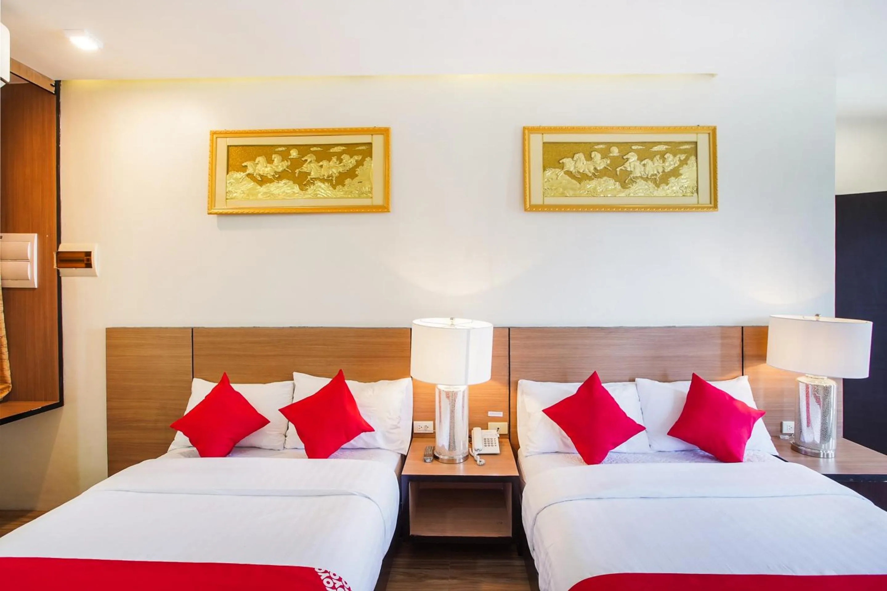 Bedroom, Bed in OYO 489 Casa Mia Hotel Suites