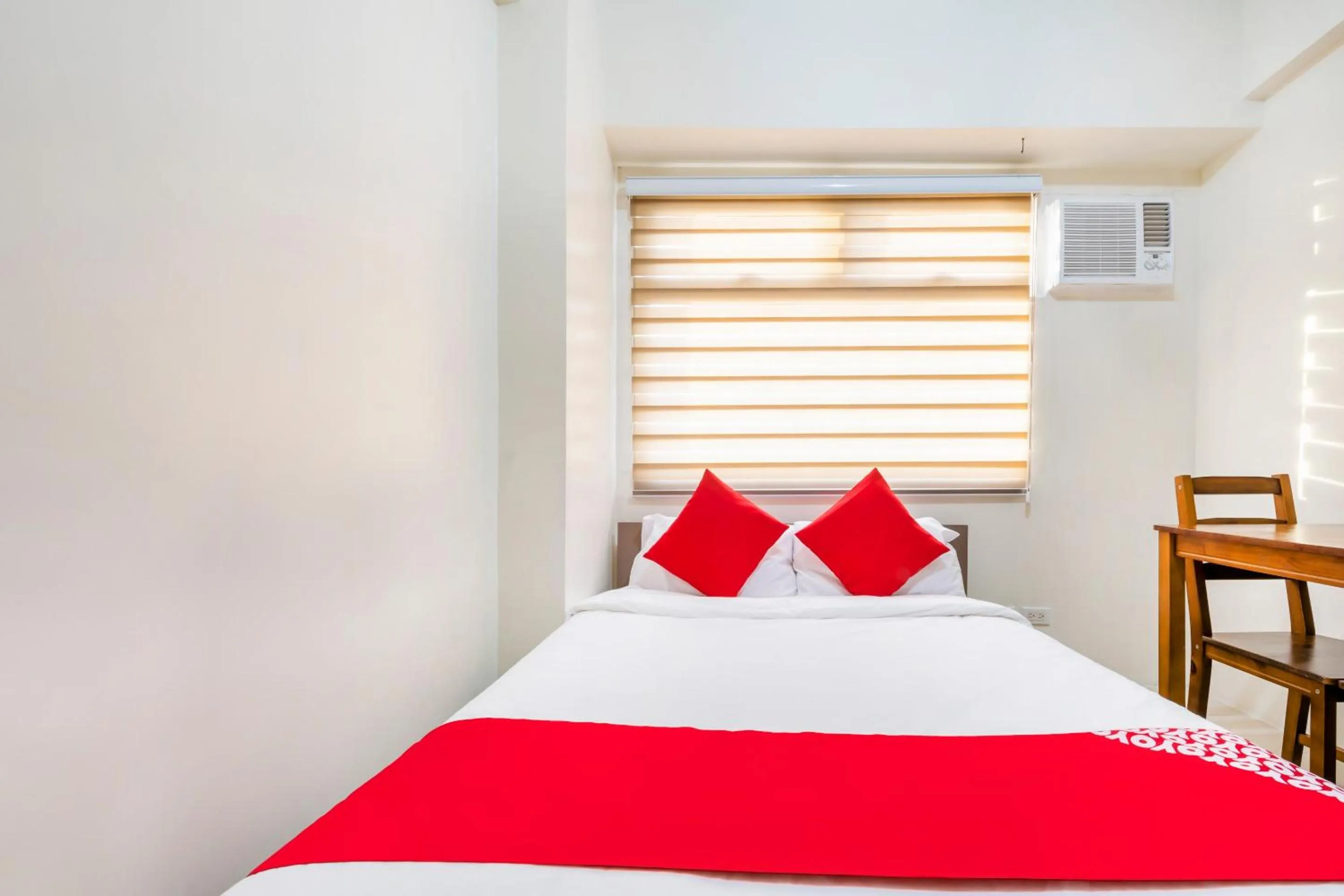 Bedroom in OYO 474 Nizami Condotel