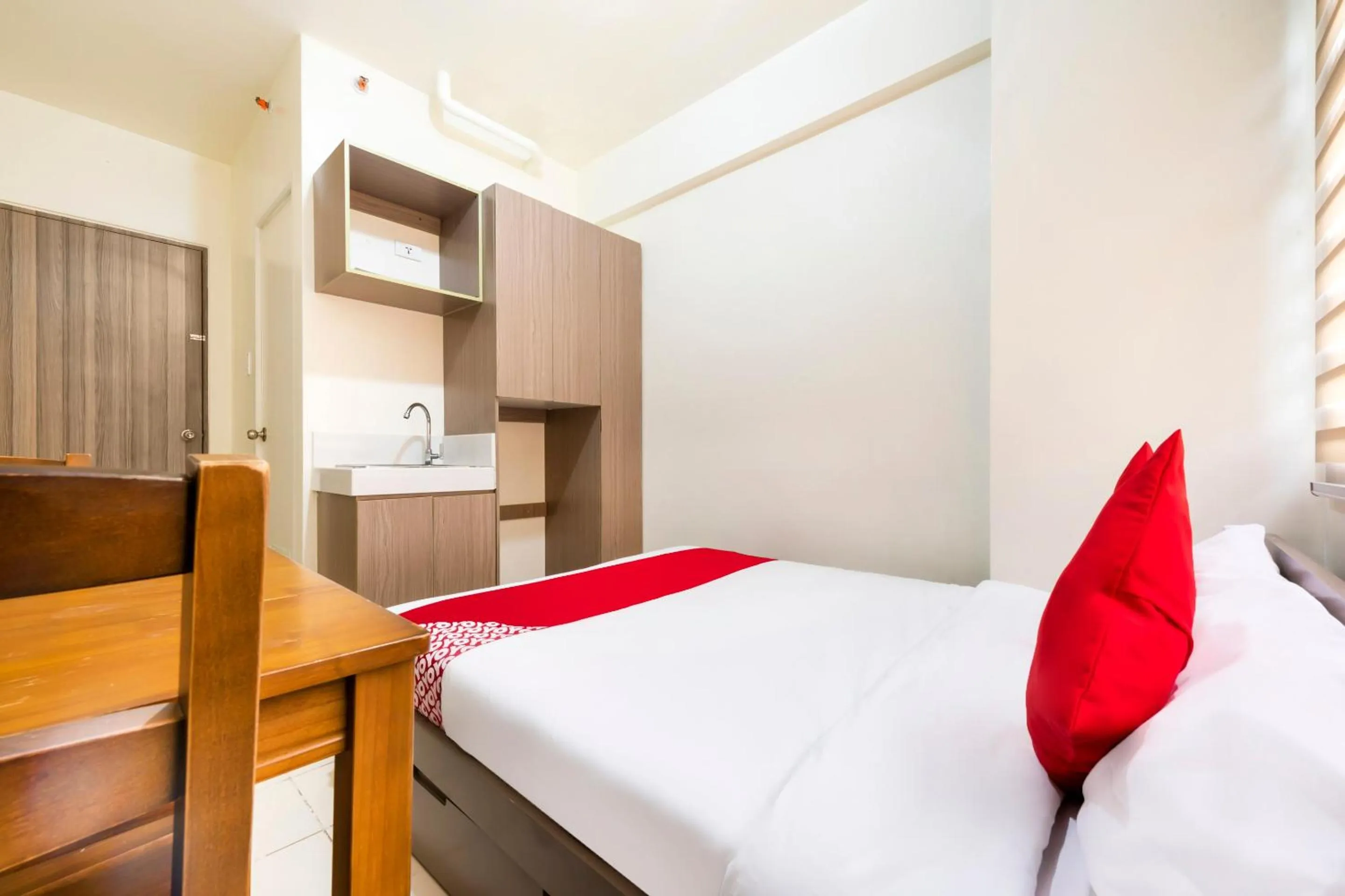 Bedroom in OYO 474 Nizami Condotel