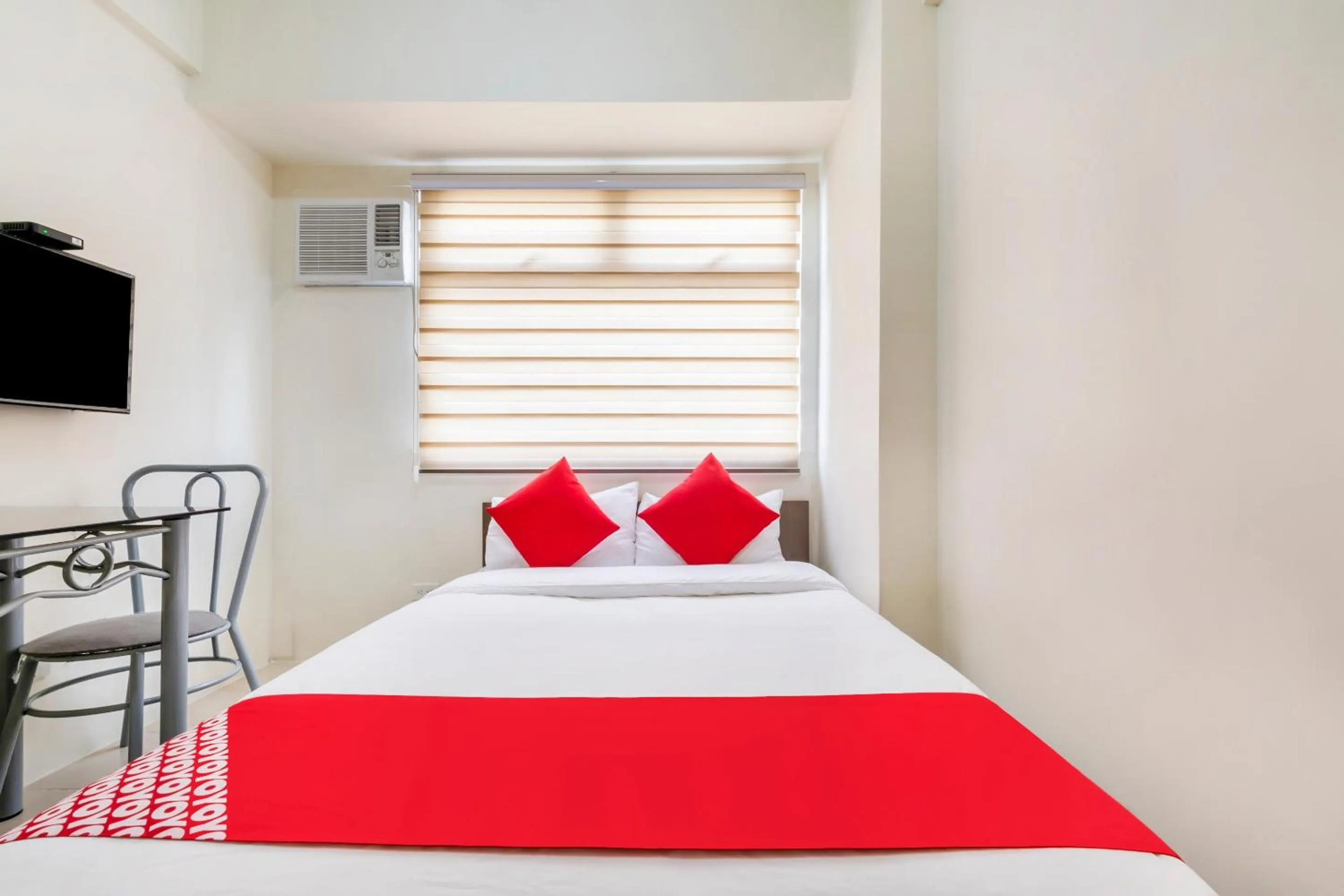 Bedroom in OYO 474 Nizami Condotel