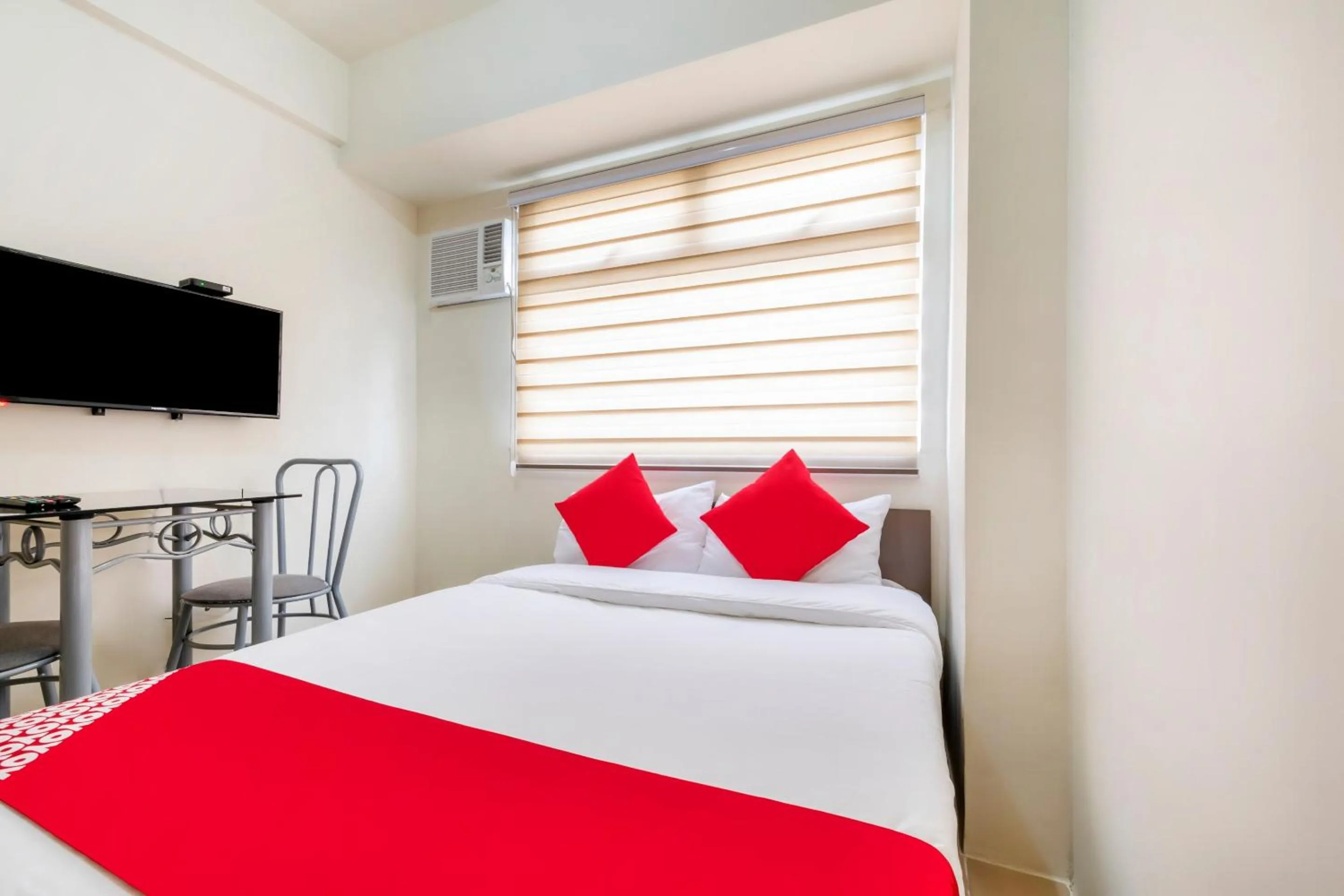 Bedroom in OYO 474 Nizami Condotel