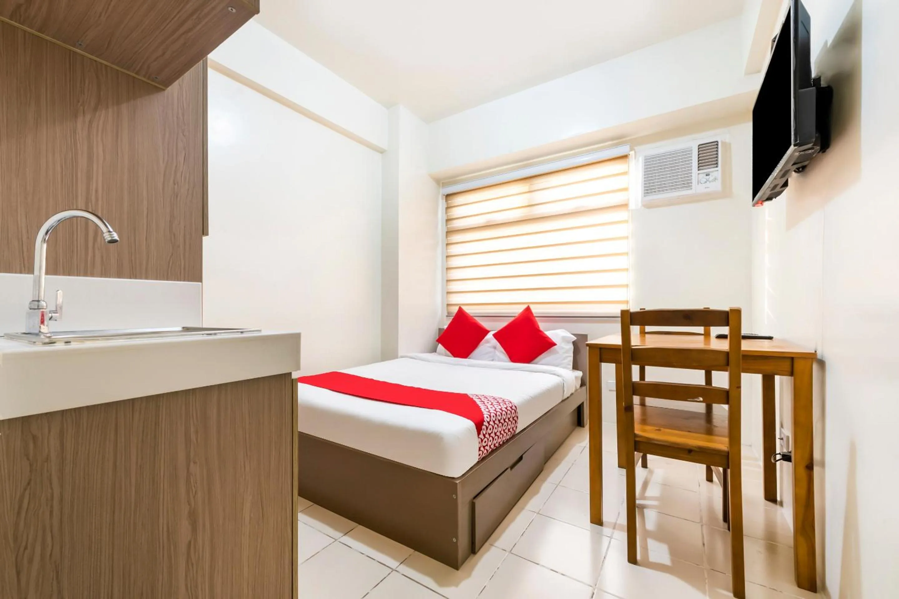 Bedroom in OYO 474 Nizami Condotel