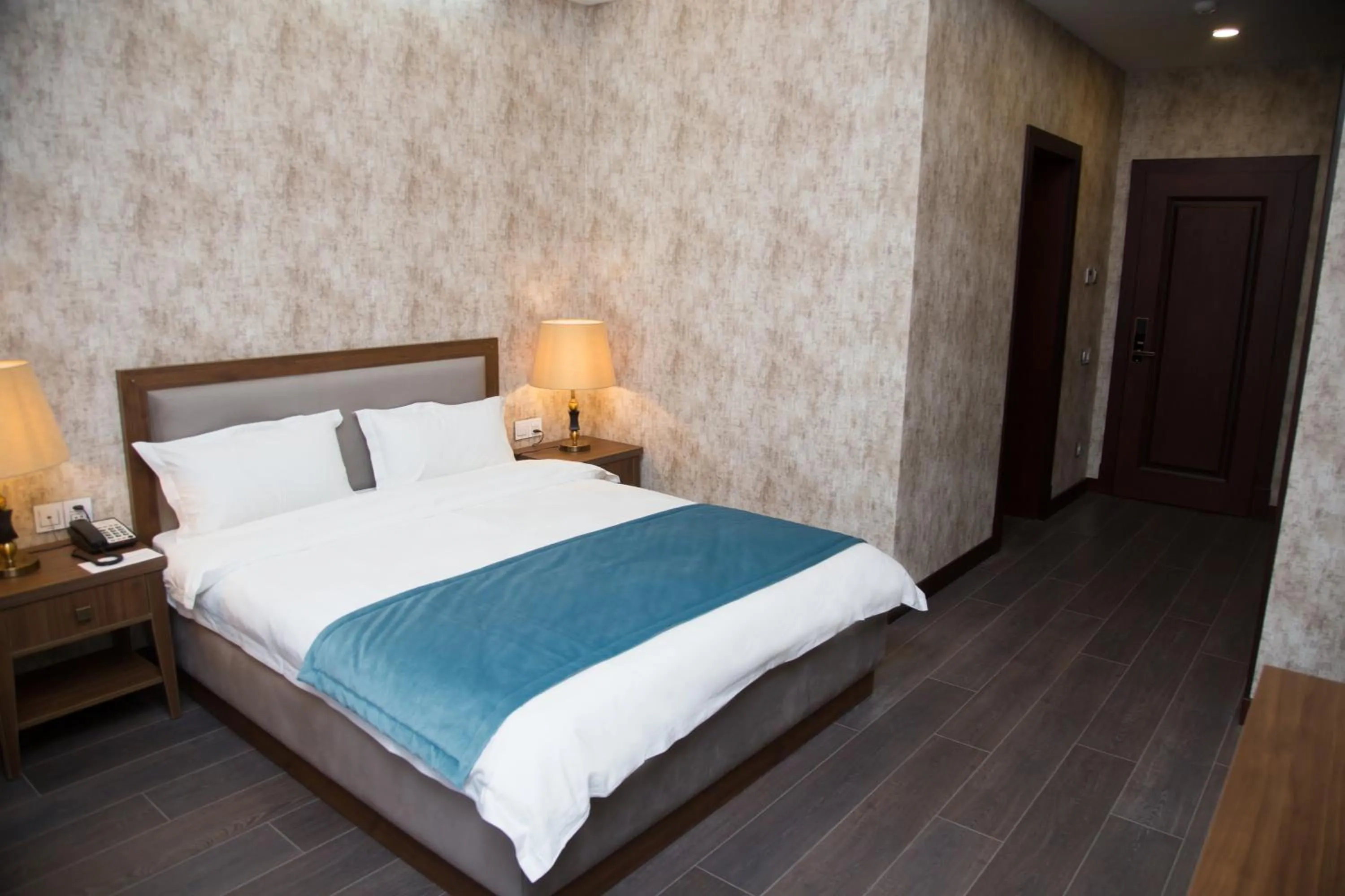 Bed in Macara Sheki City Hotel