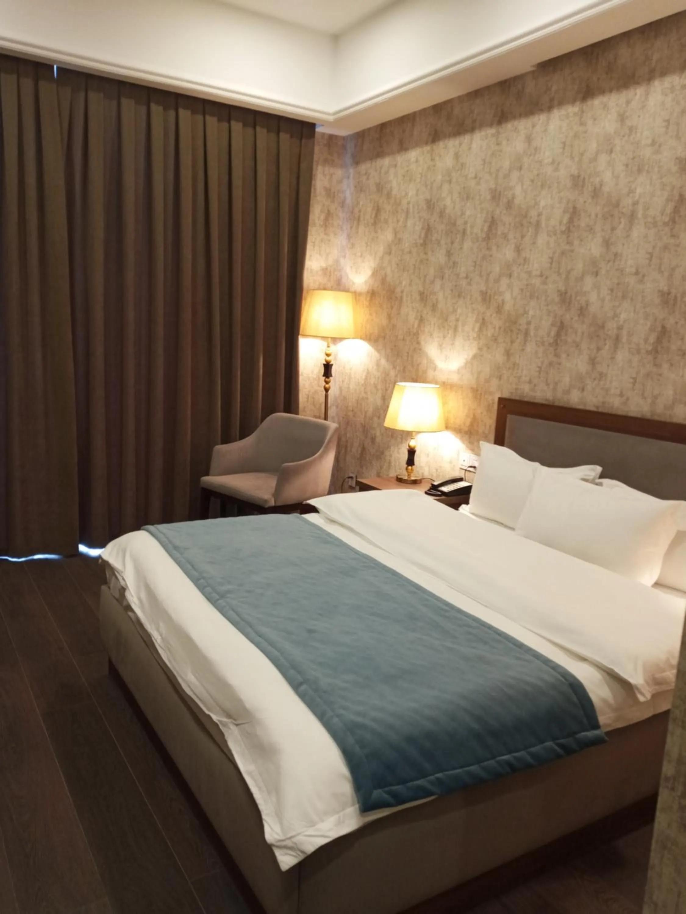 Bed in Macara Sheki City Hotel