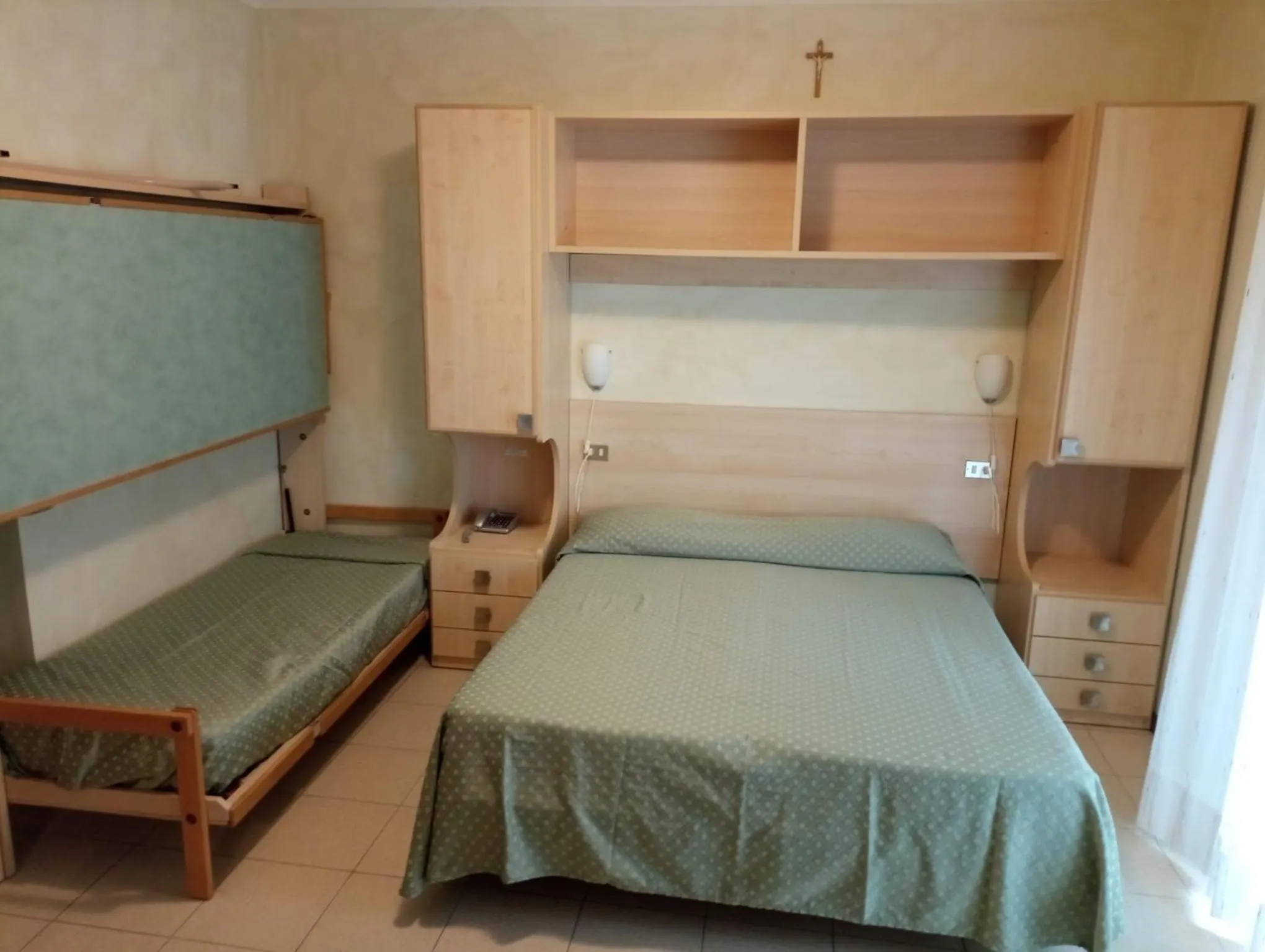 Bed in Hotel Arlecchino