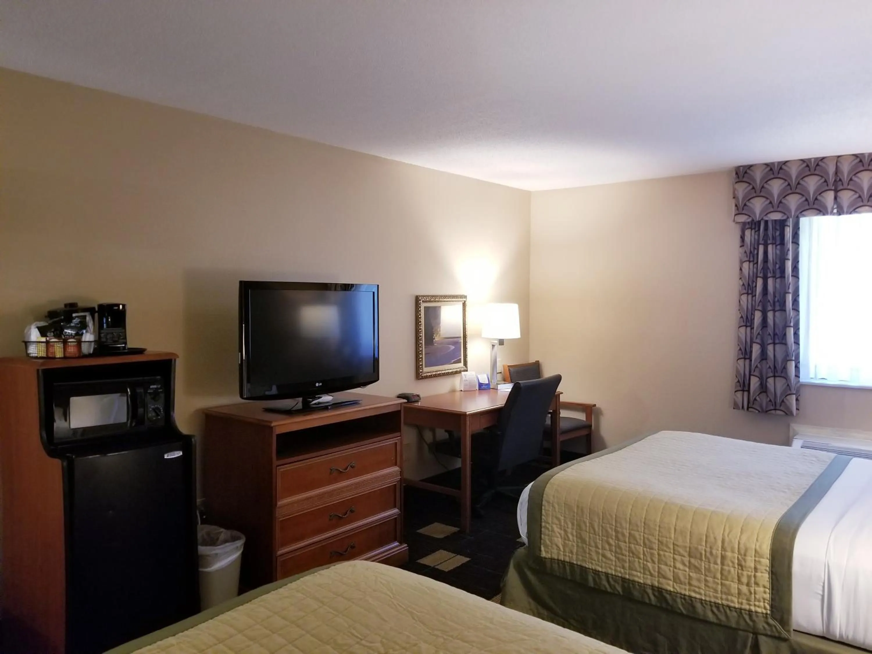 Bed in Baymont by Wyndham Indianapolis West