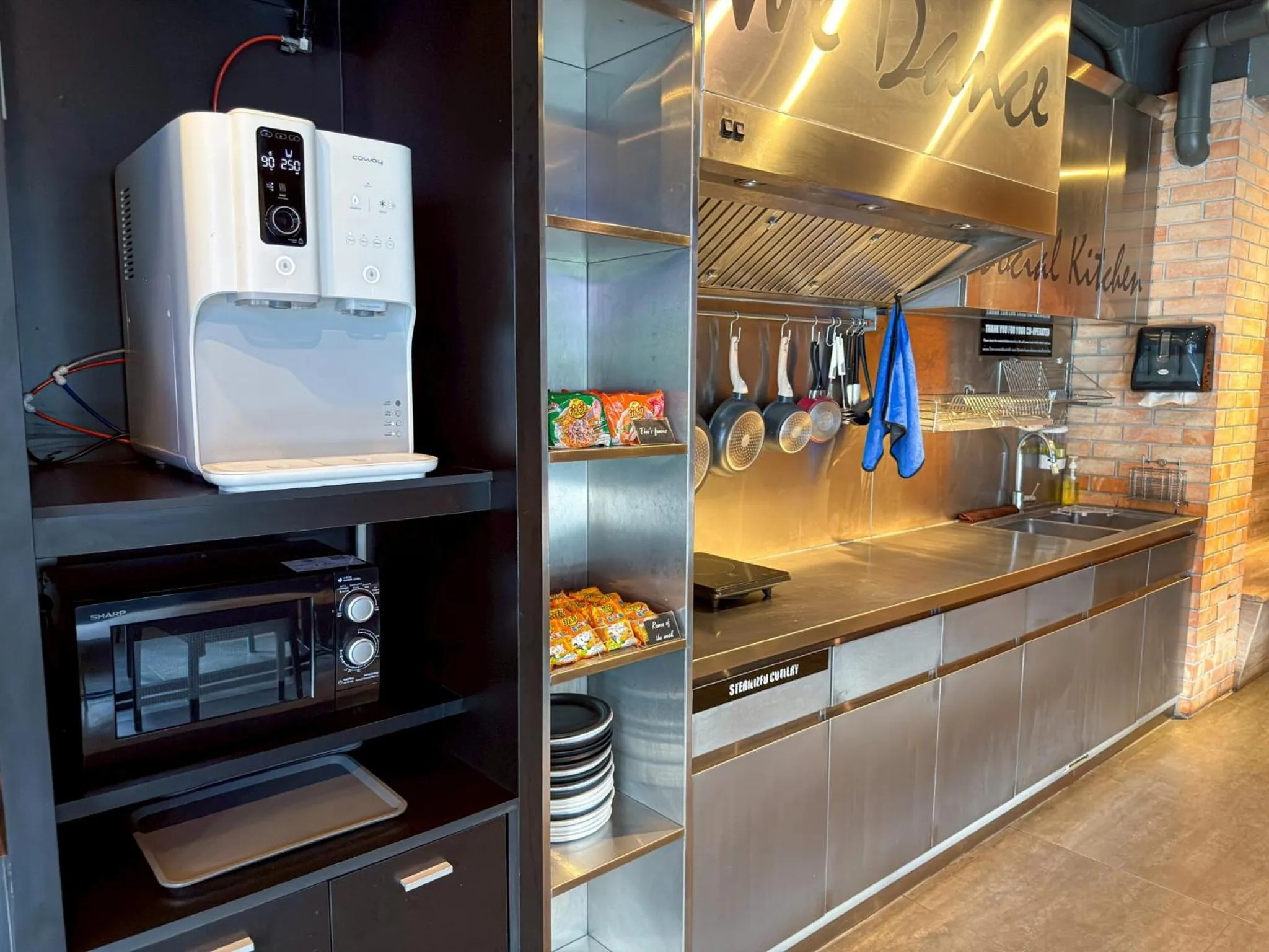 Communal kitchen in Hotel Ordinary Bangkok