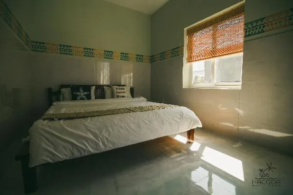Bed in Hacoda Homestay