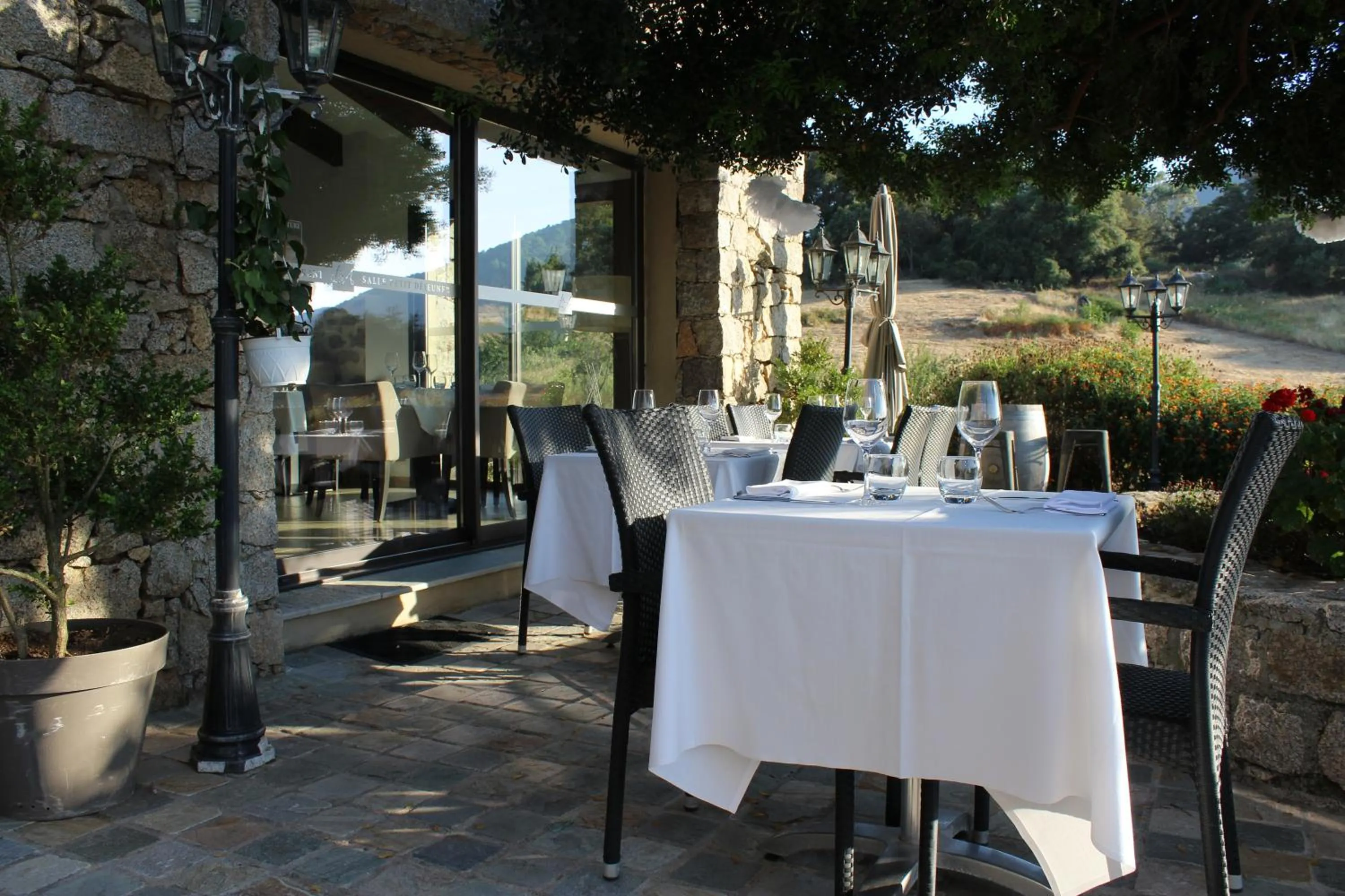 Dining area in Hotel & Restaurant Les Bergeries d'Alata