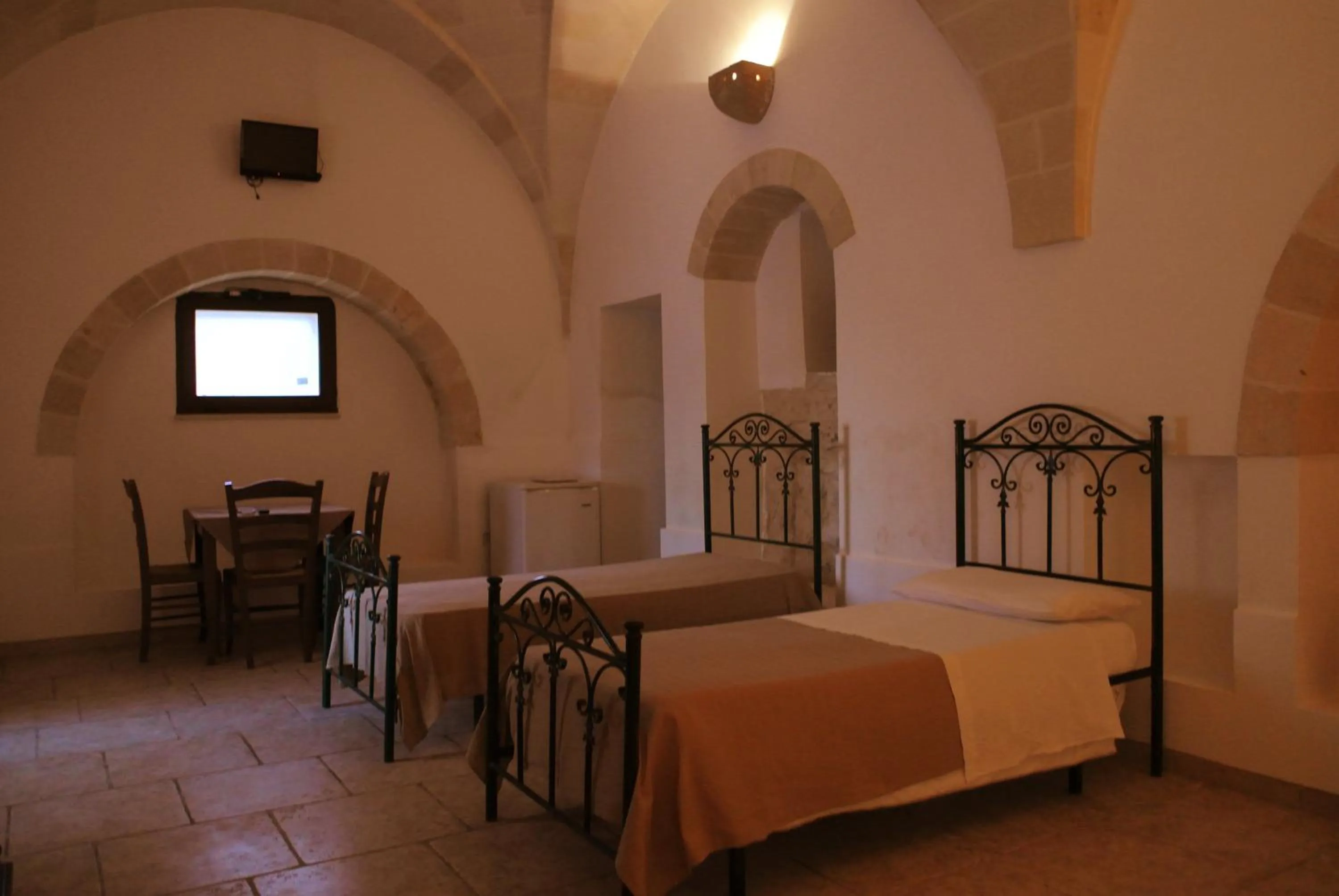 Photo of the whole room, Bed in Masseria Nuova