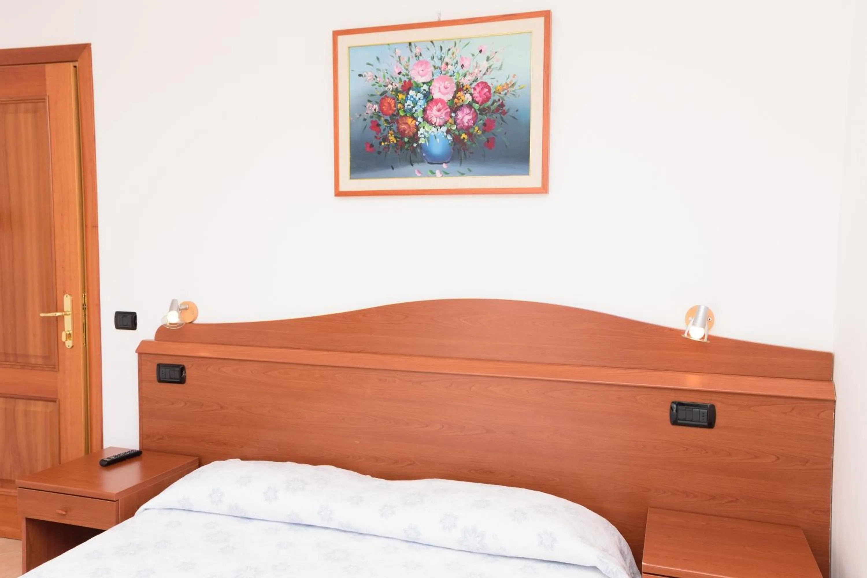 Bedroom in Hotel Villa Fumerie