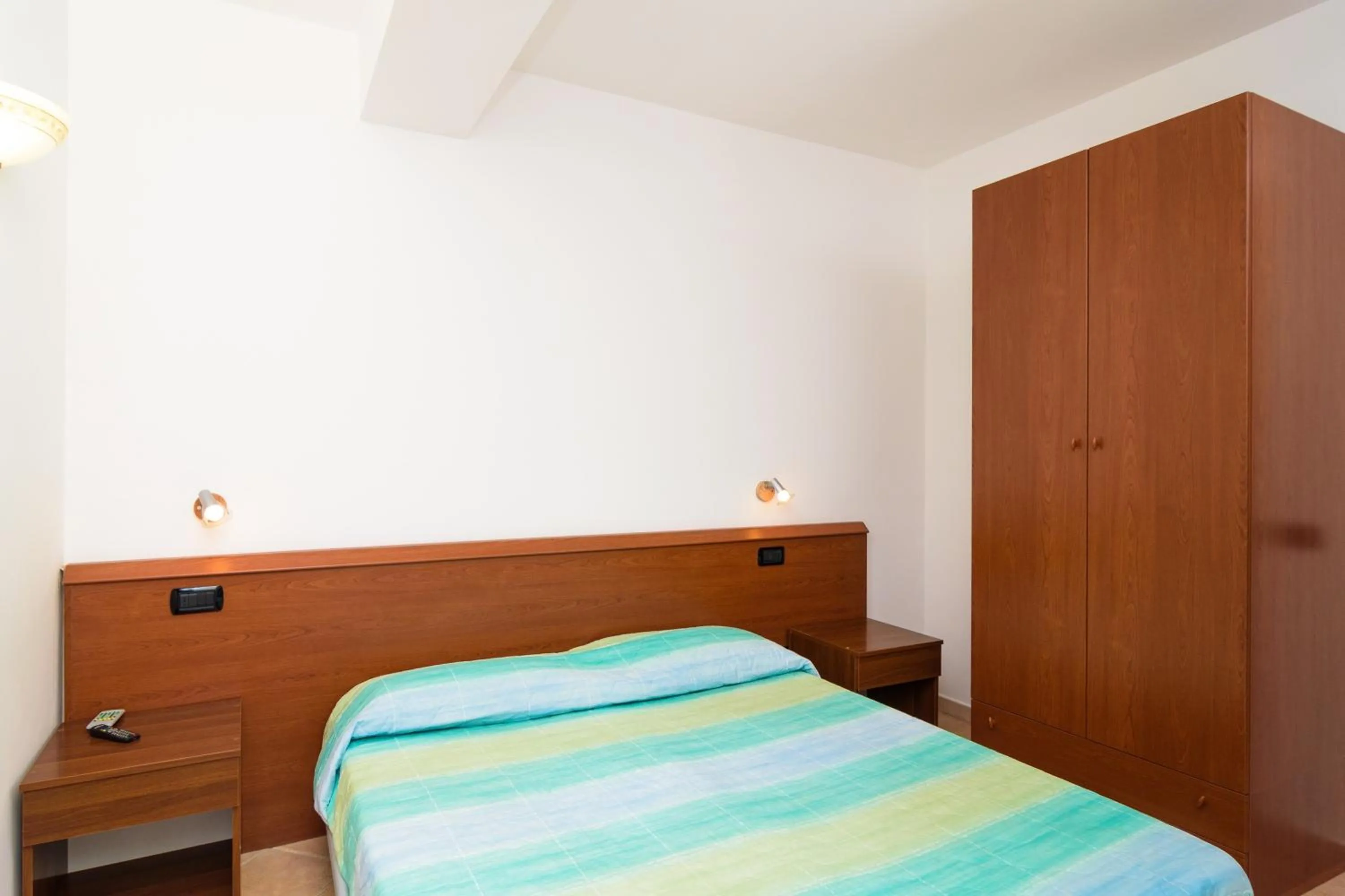 Bedroom in Hotel Villa Fumerie