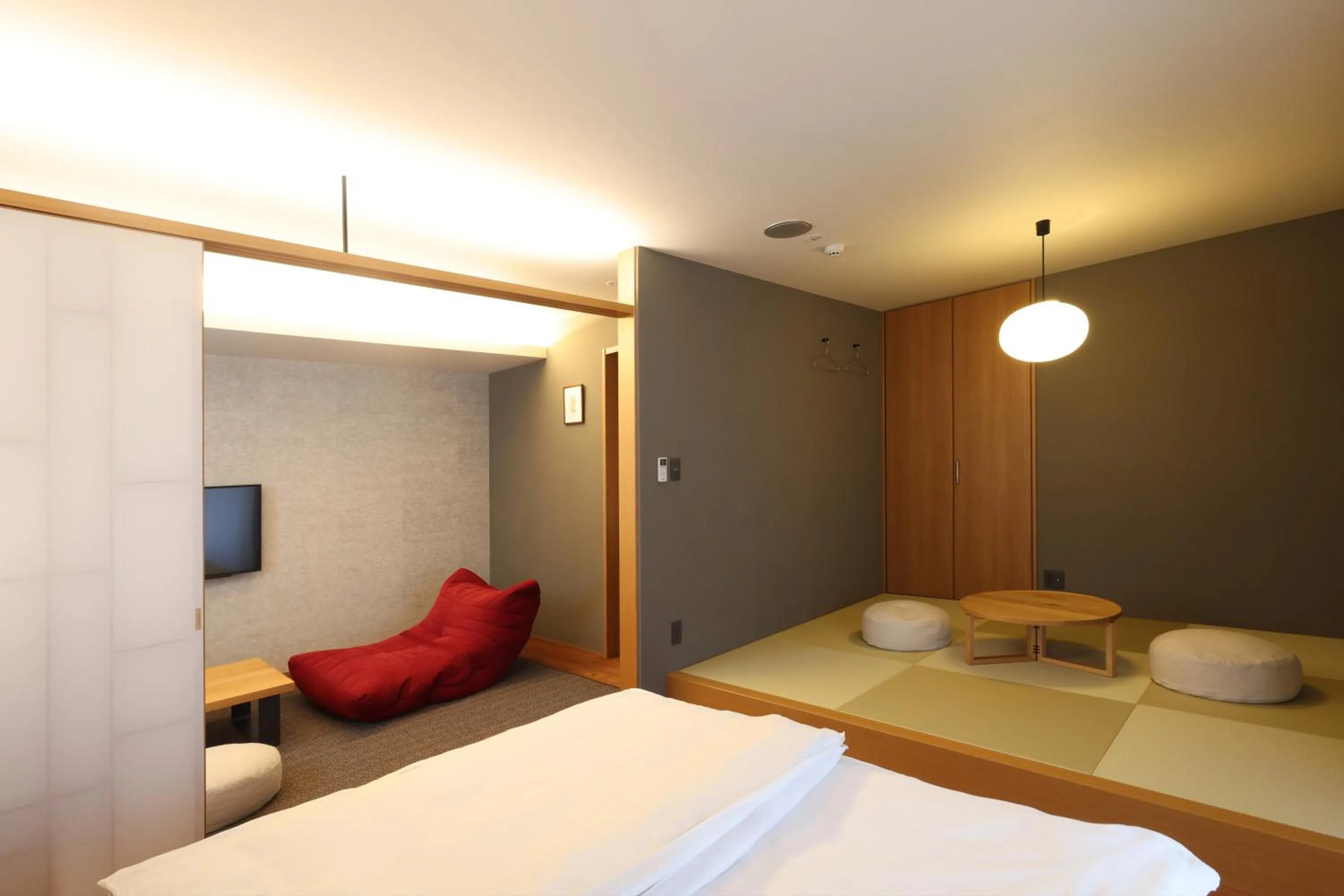 Bed in Neon Hotel - Luxury Sleep Retreat -