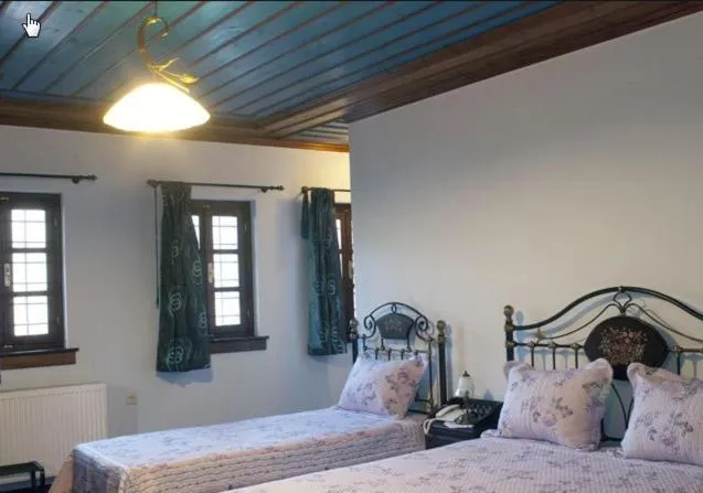 Bed in Hotel Dryades