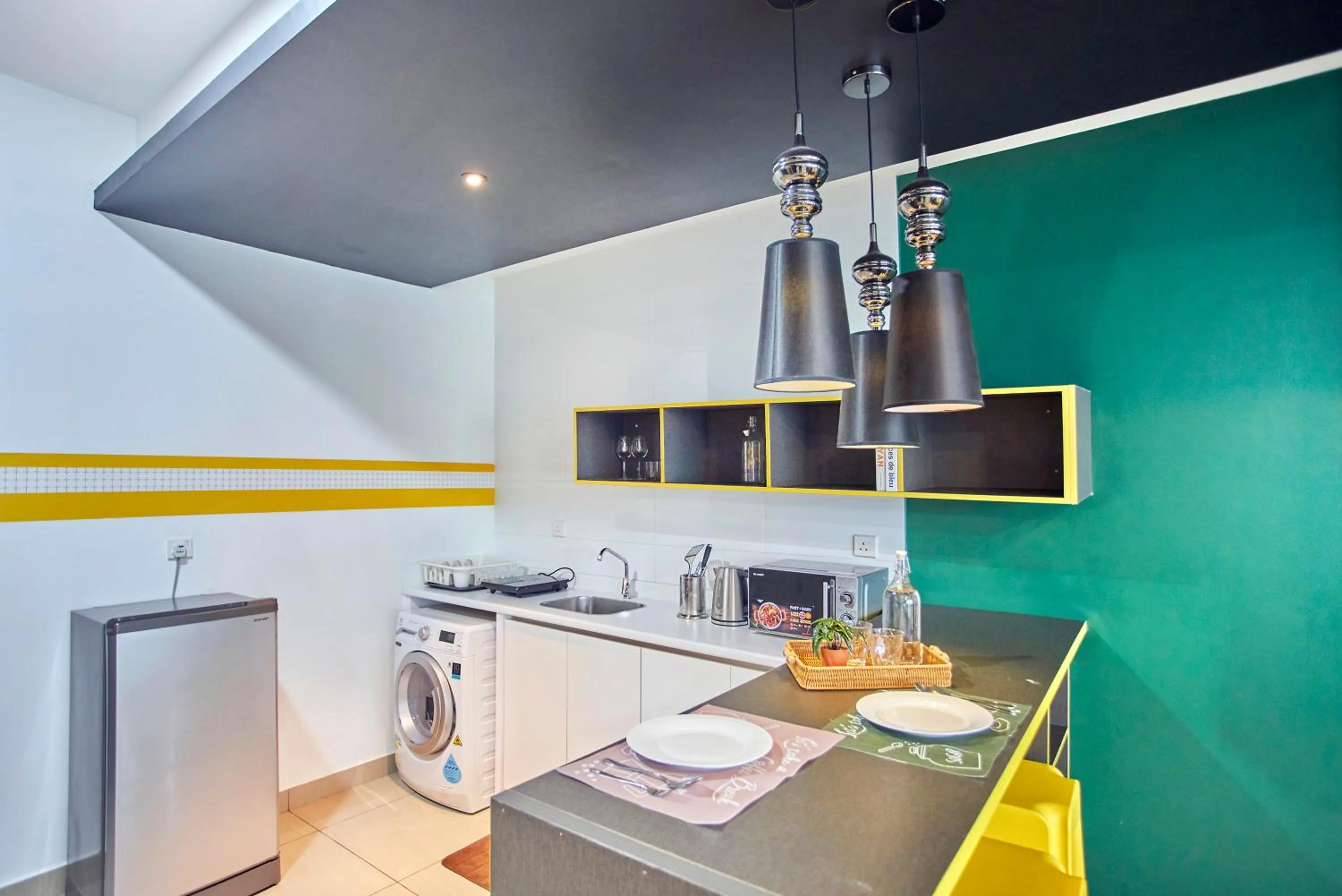 Kitchen or kitchenette in Arte Plus KLCC Designer Suites by Cobnb