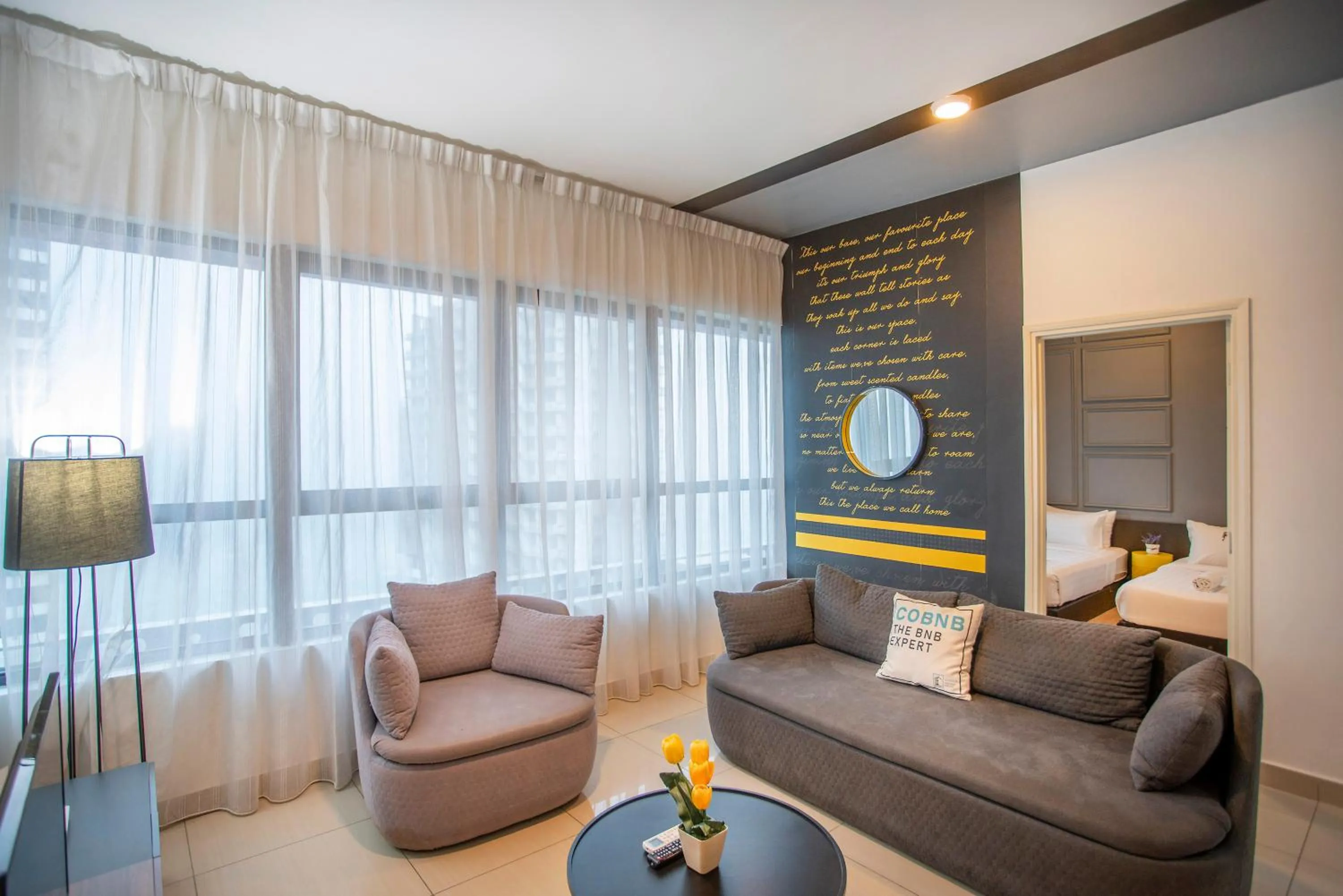 Living room in Arte Plus KLCC Designer Suites by Cobnb
