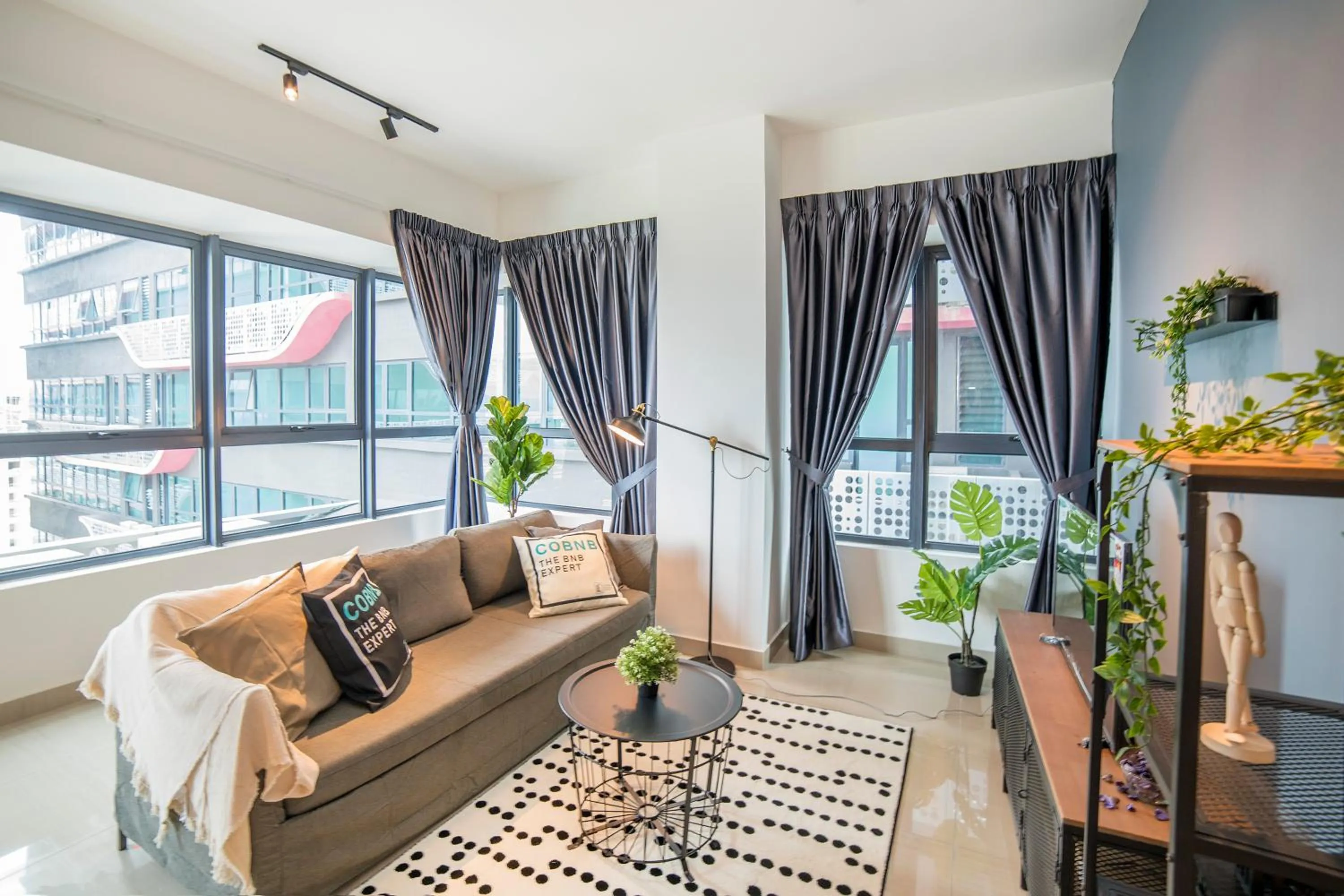 Living room in Arte Plus KLCC Designer Suites by Cobnb