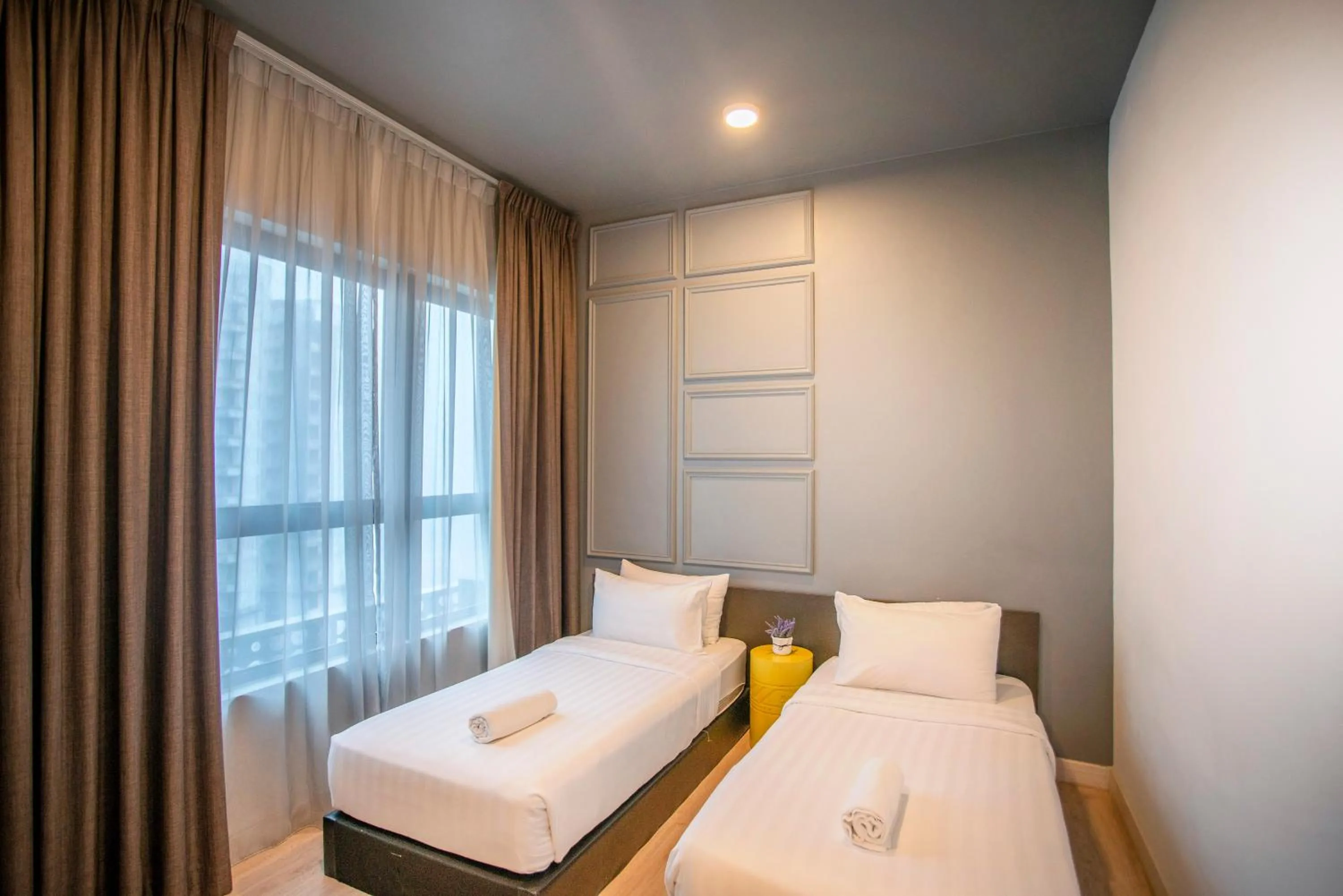 Bed in Arte Plus KLCC Designer Suites by Cobnb