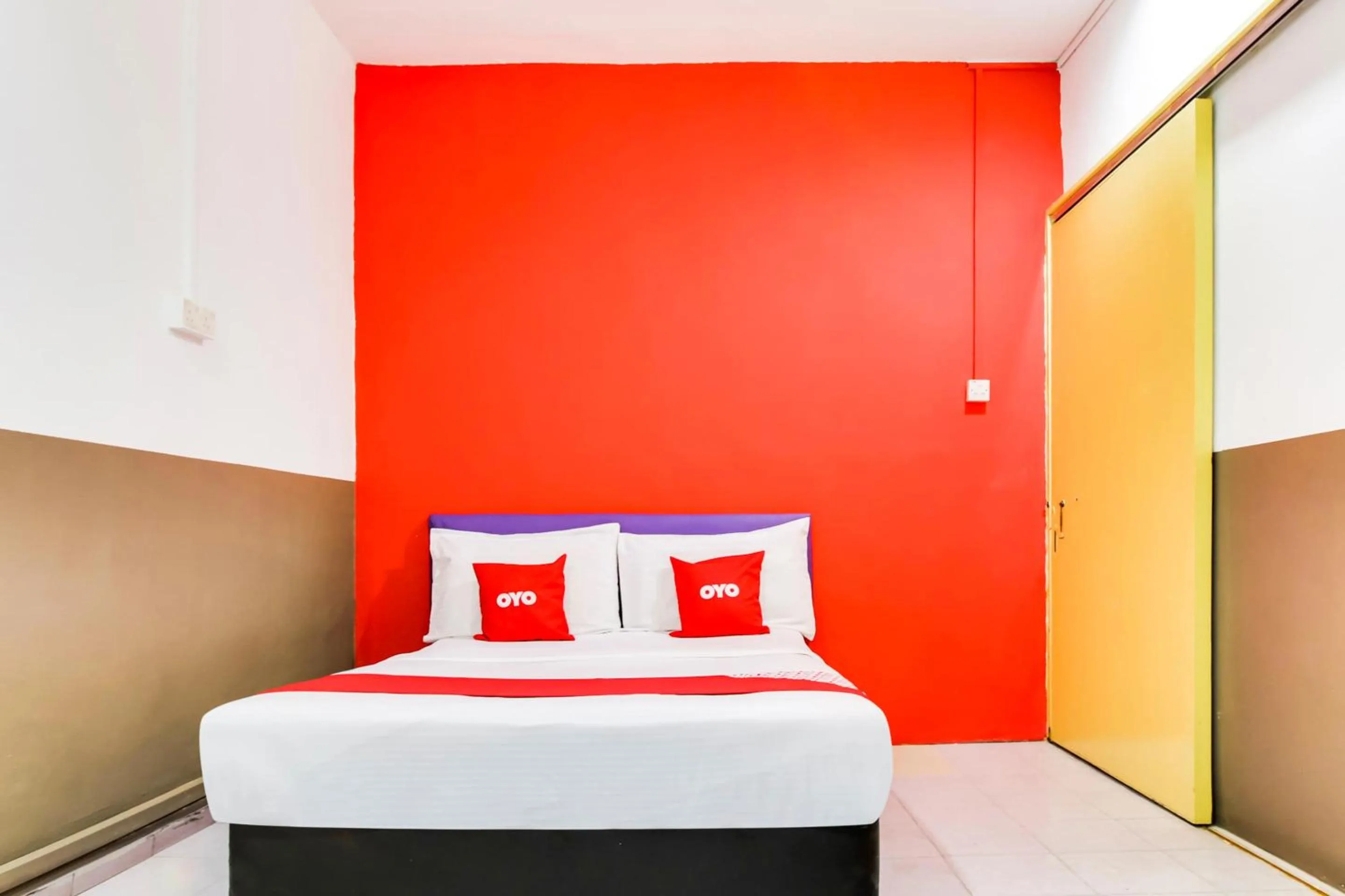 Bedroom in OYO 89615 T Family Hotel