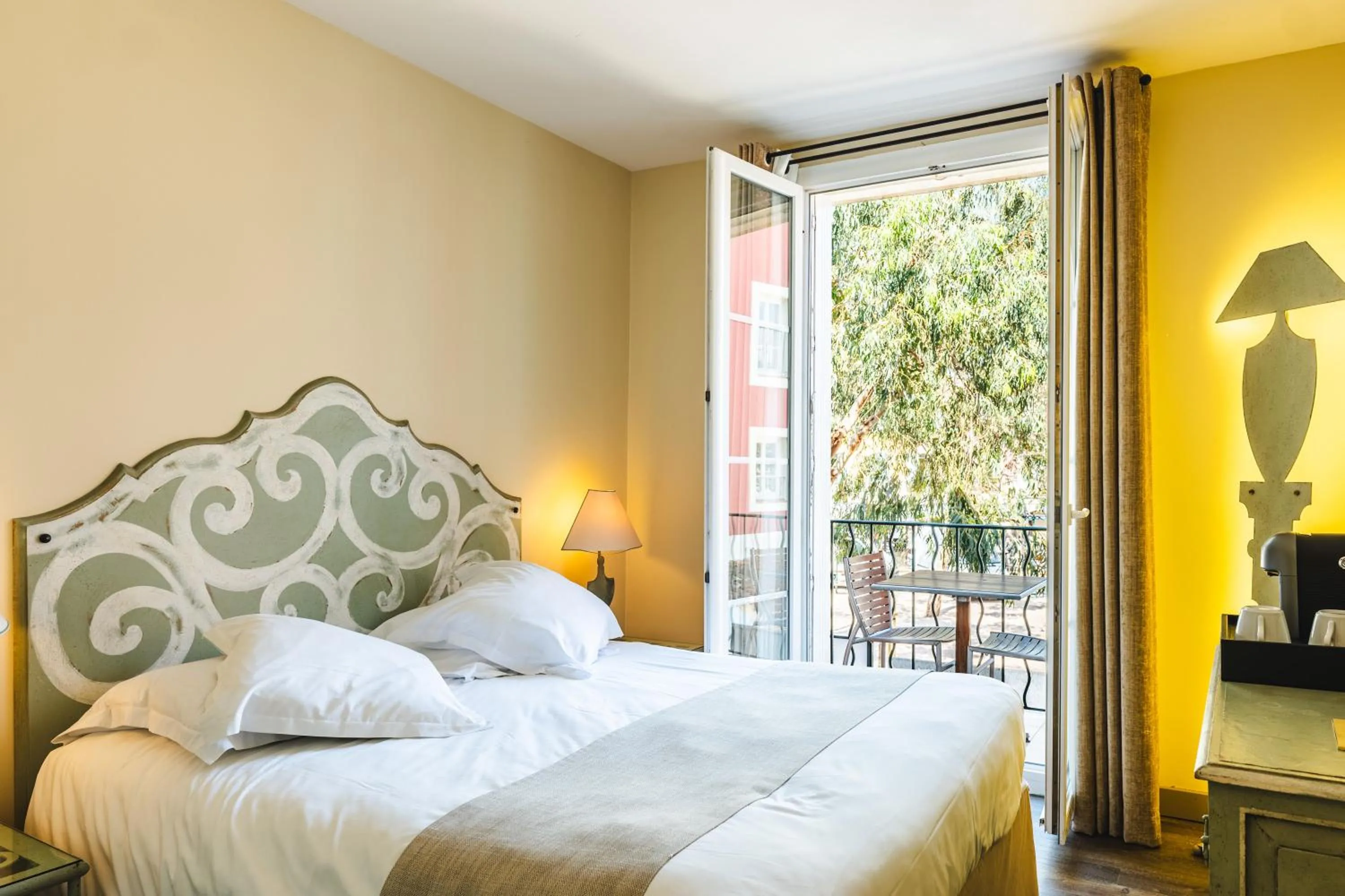 Bedroom in Le Suffren Hôtel