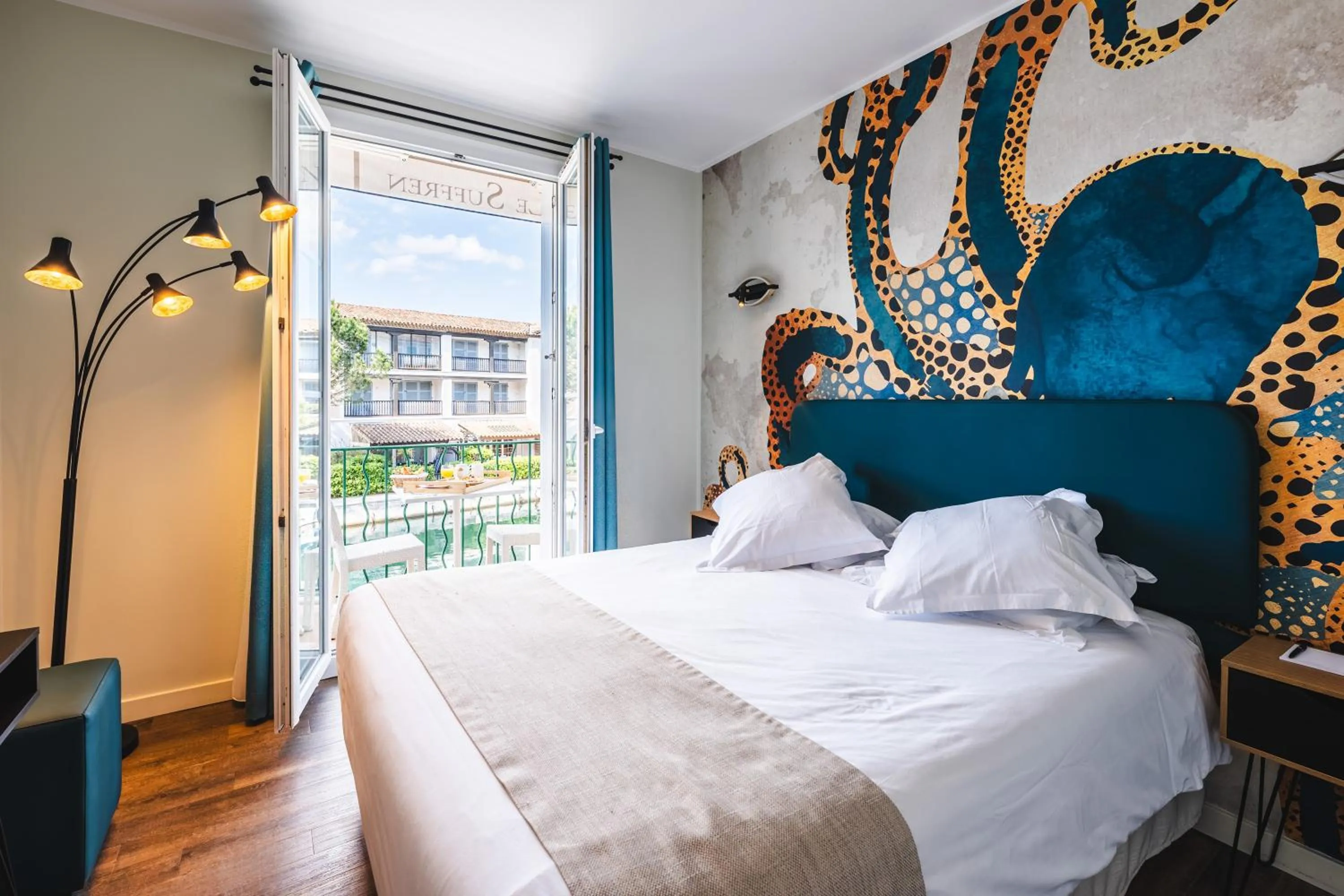 Bedroom in Le Suffren Hôtel