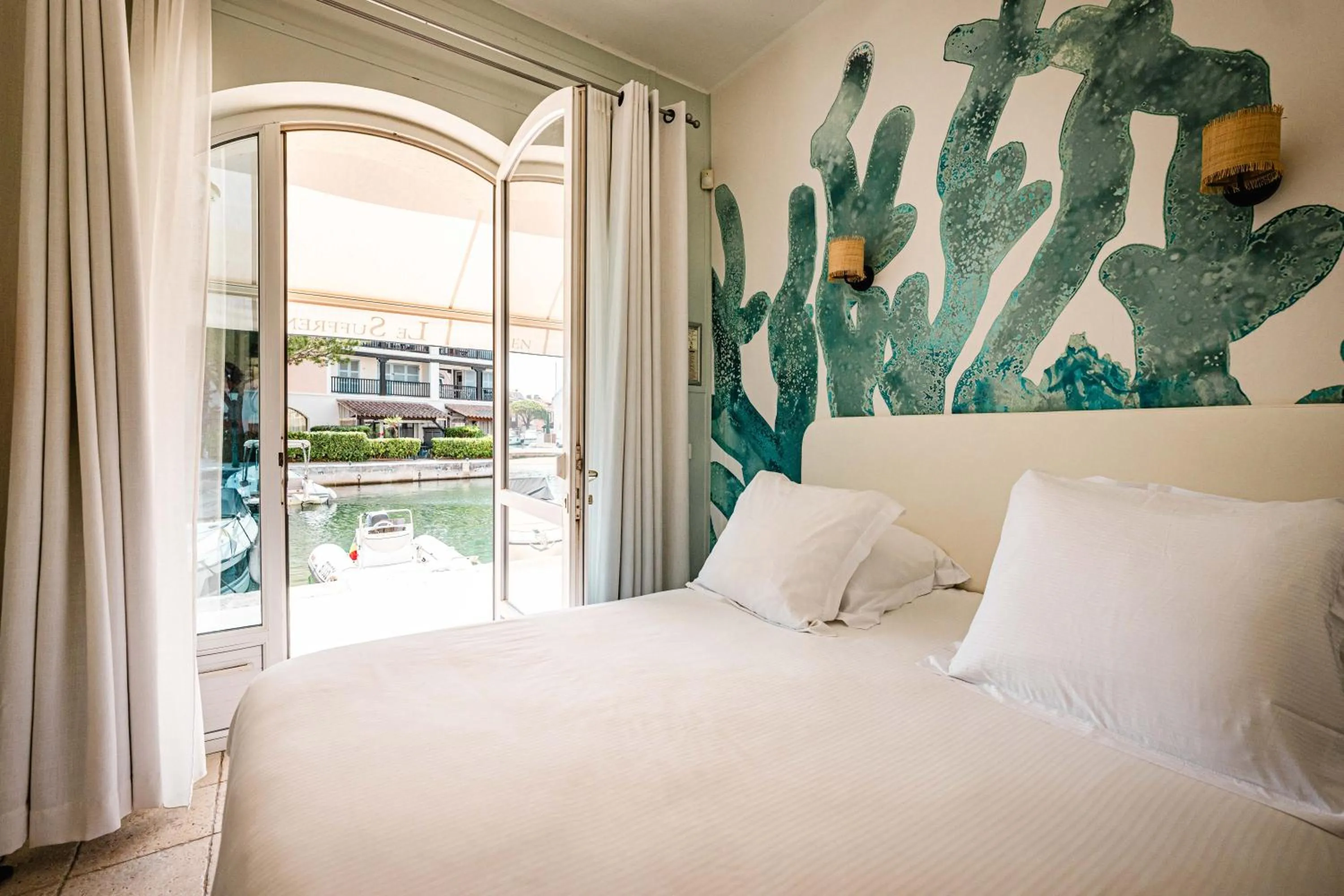 Bedroom, Bed in Le Suffren Hôtel