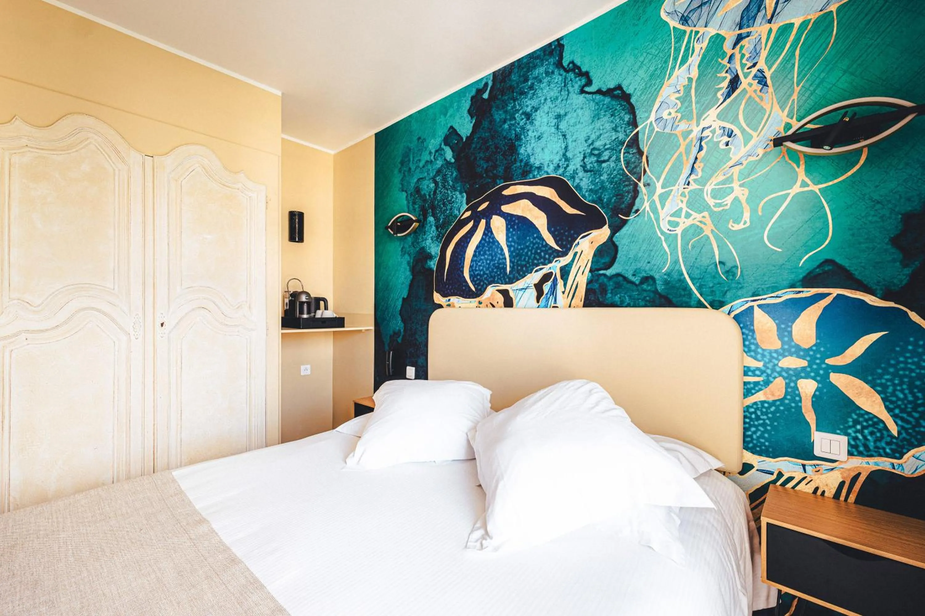 Bedroom in Le Suffren Hôtel