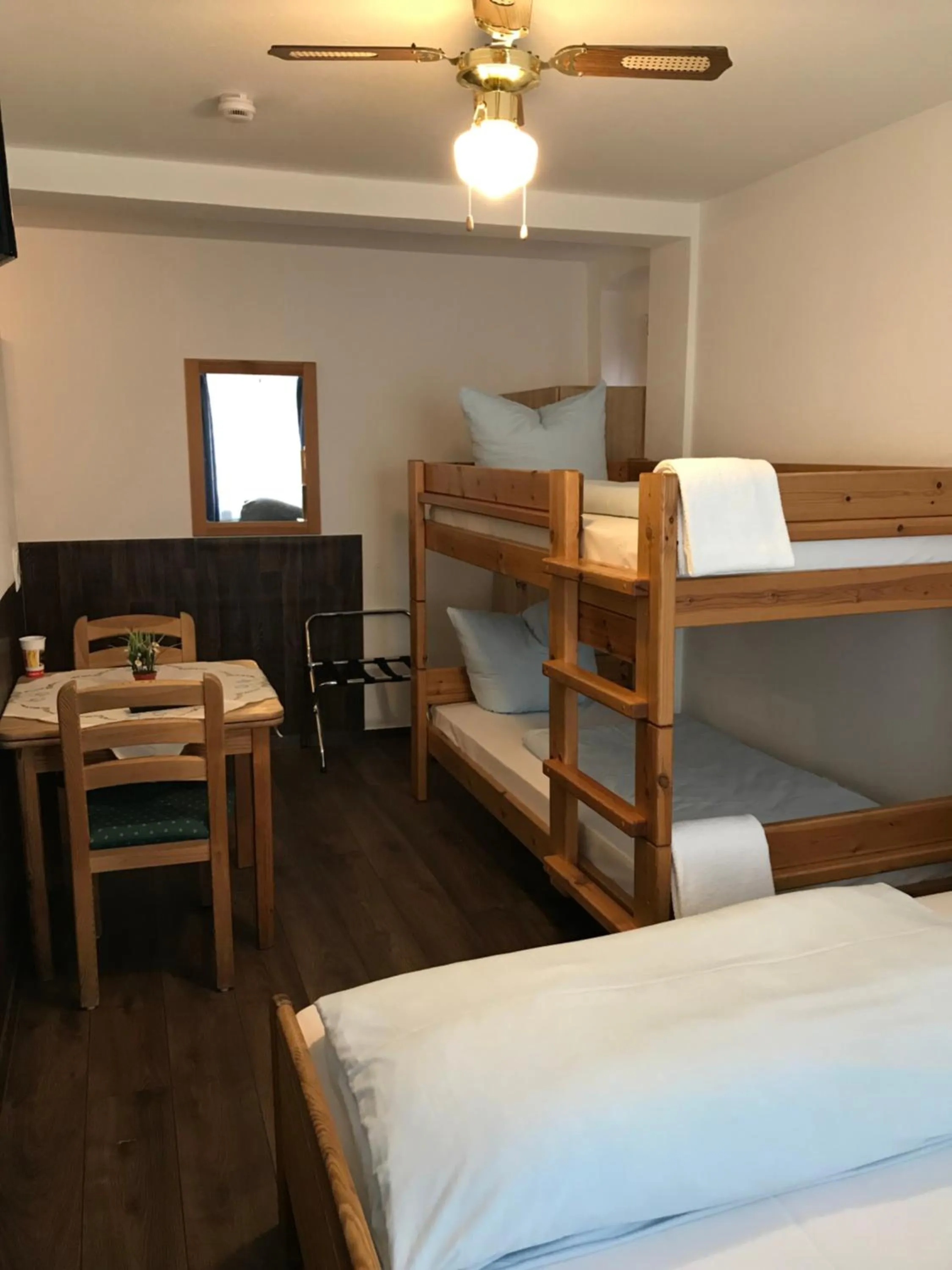 Bed in Hotel Guntia Boardinghouse virtueller check in und Zimmer Zugang