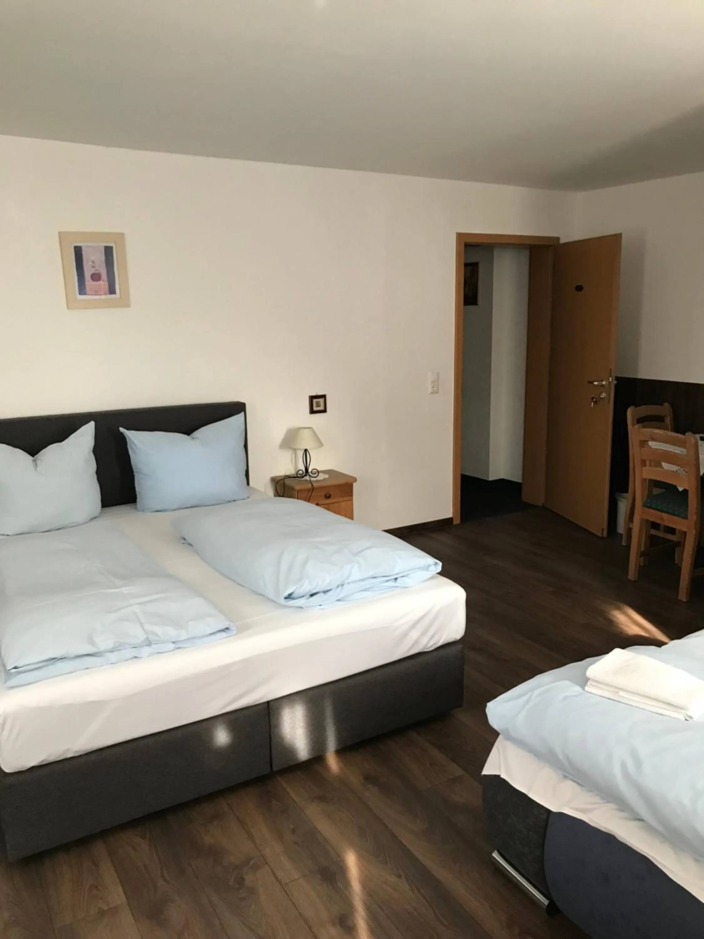 Bed in Hotel Guntia Boardinghouse virtueller check in und Zimmer Zugang