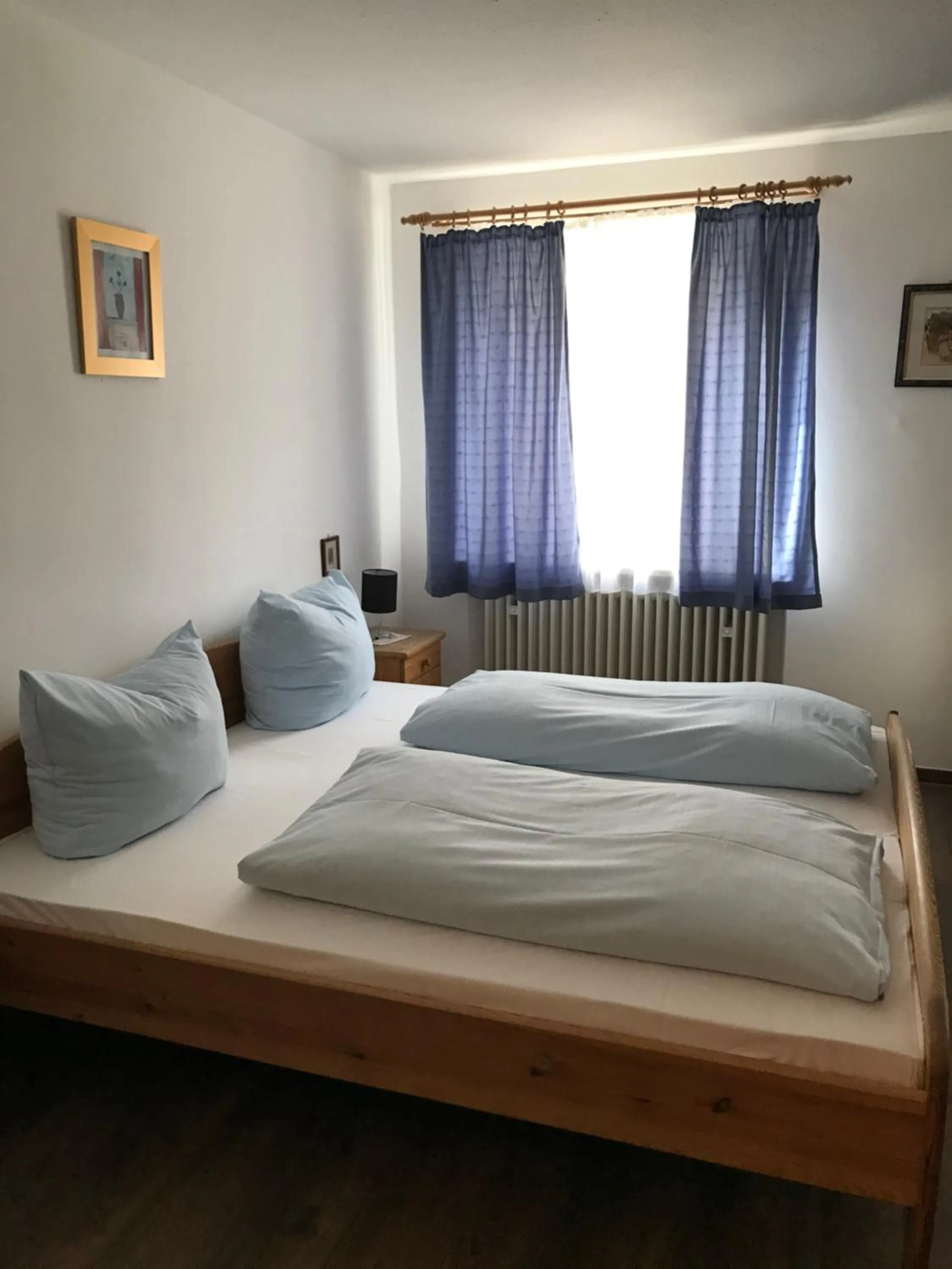 Bed in Hotel Guntia Boardinghouse virtueller check in und Zimmer Zugang