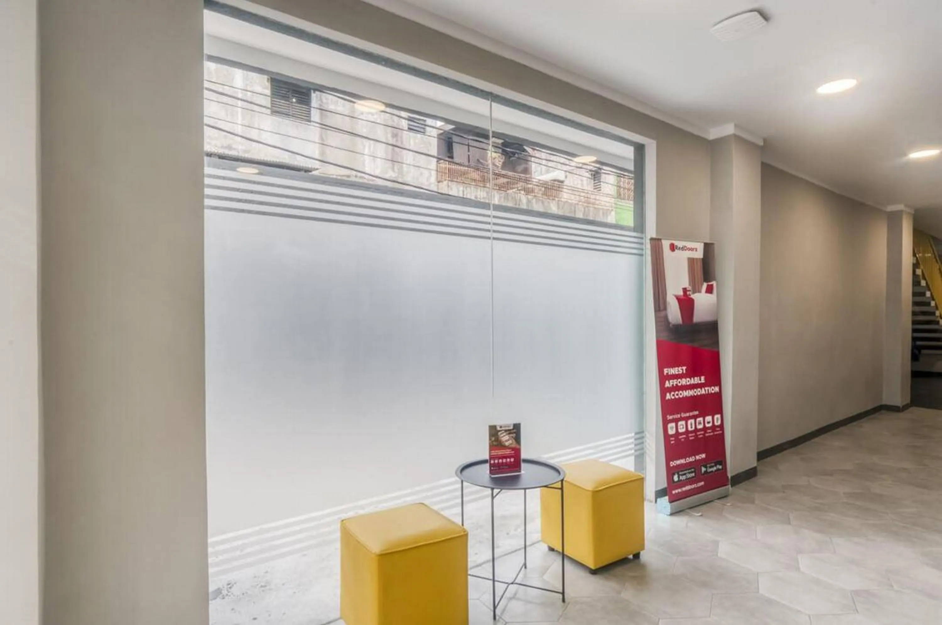 Seating area in RedDoorz Plus at Cideng Timur