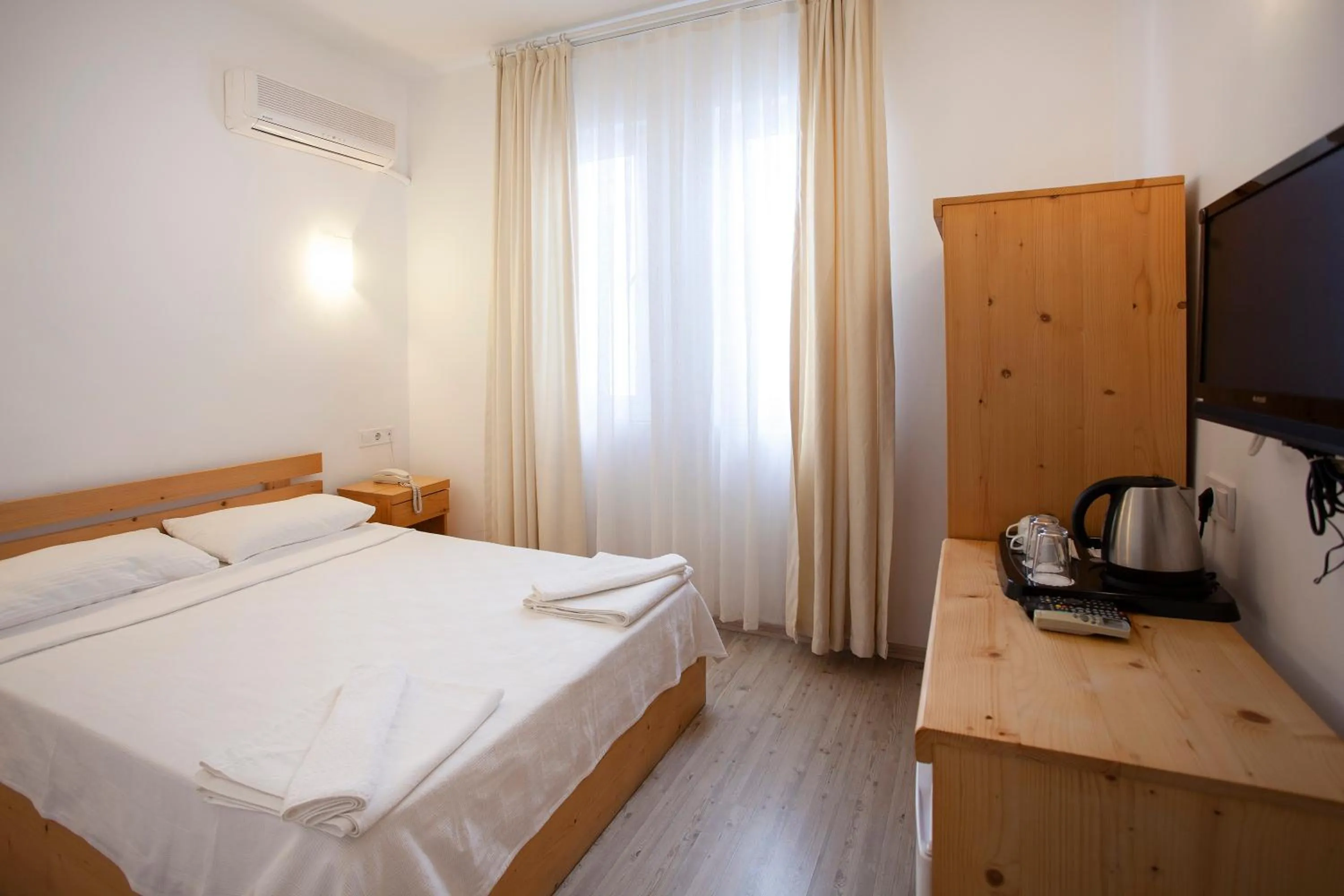 Bed in Zephyros City Otel