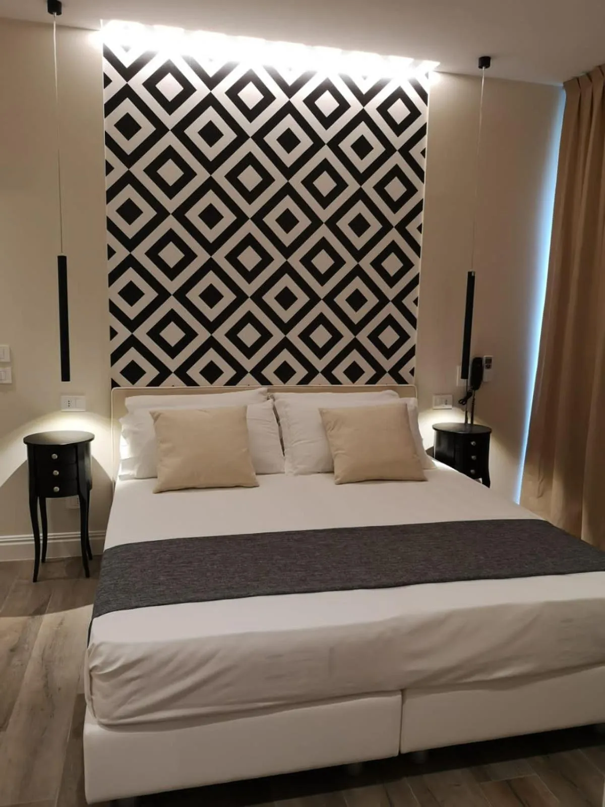 Bed in Luxmarì Hotel & Spa