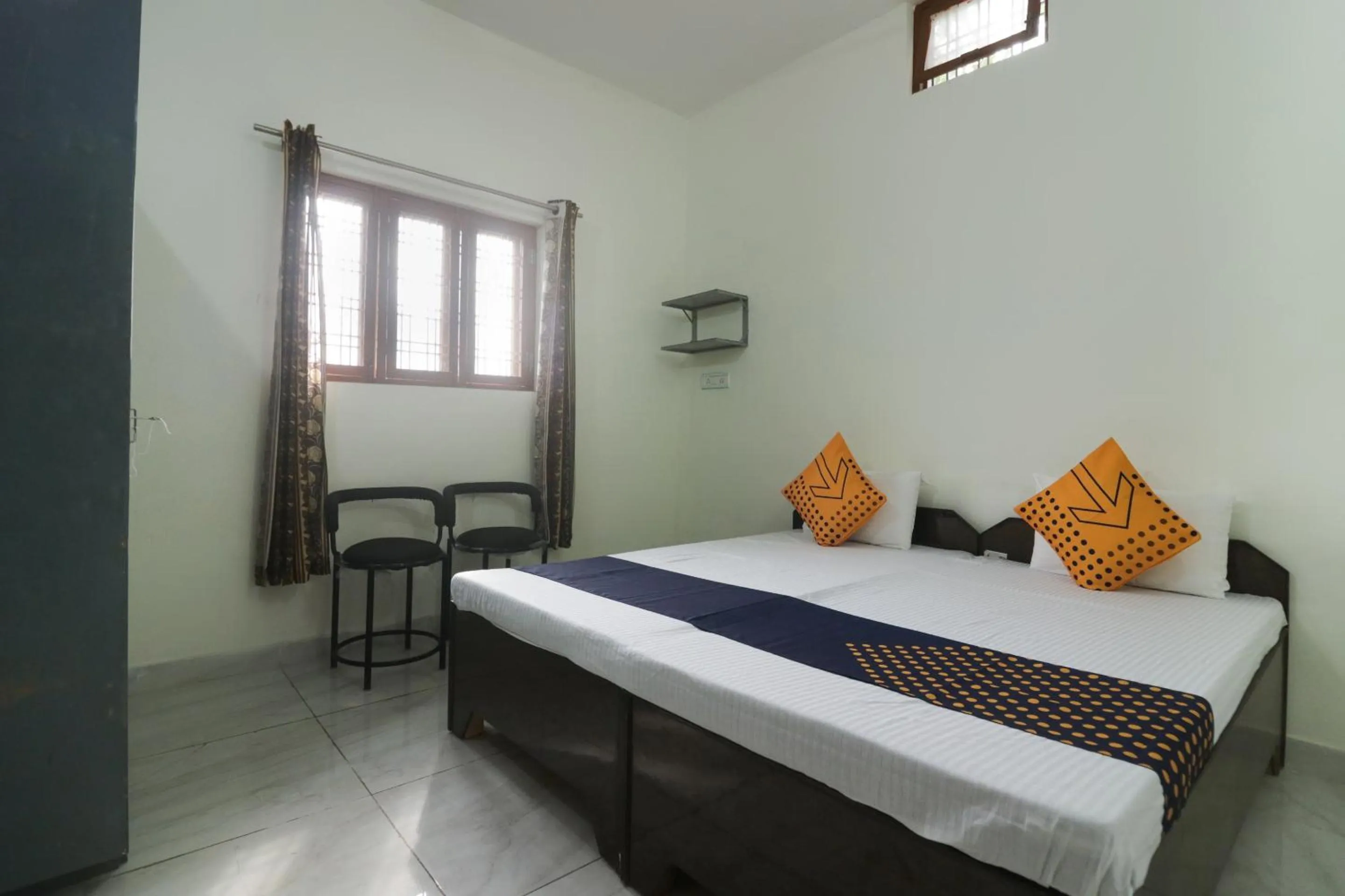 Bedroom, Bed in SPOT ON Sneha Home Stay