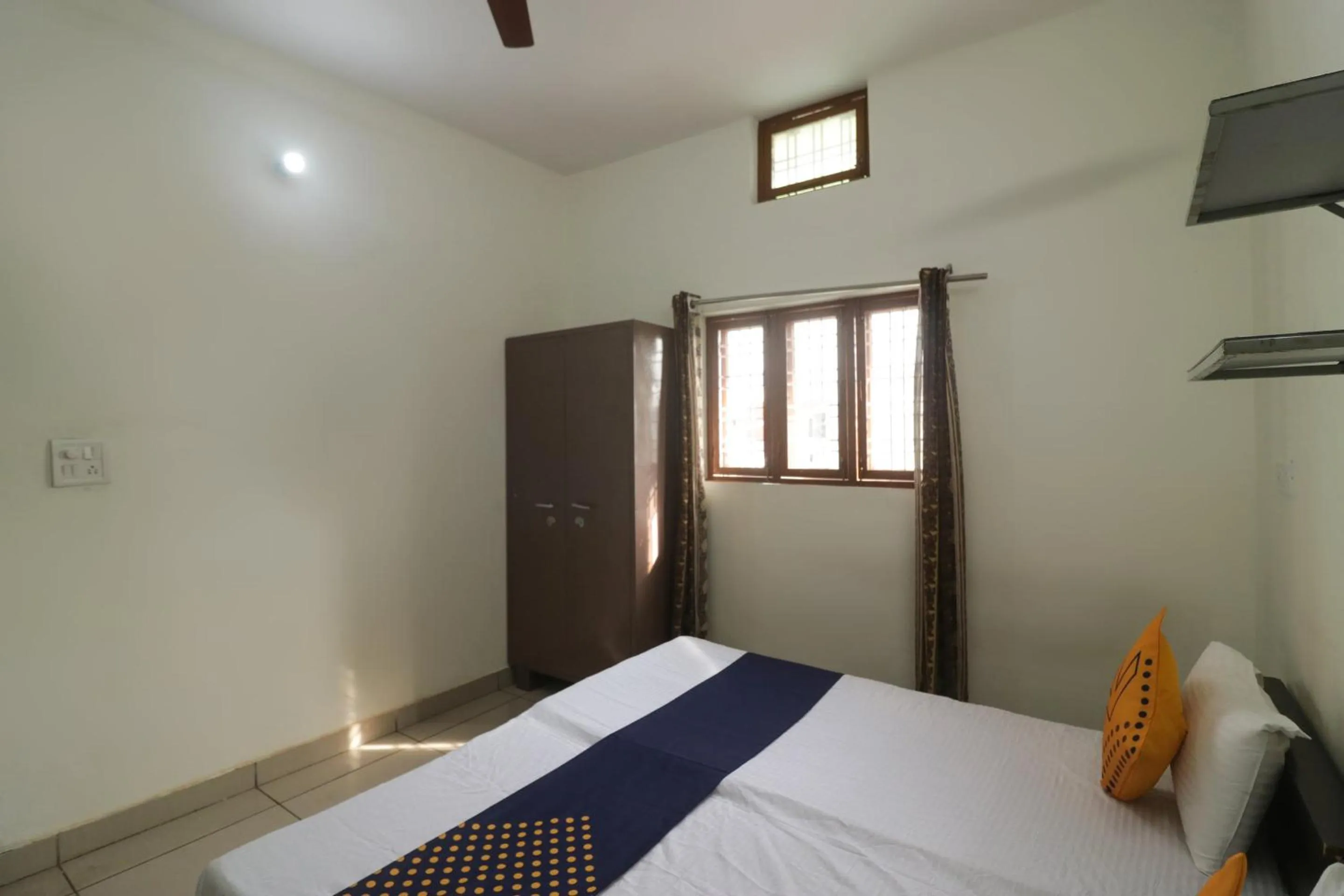 Bedroom, Bed in SPOT ON Sneha Home Stay