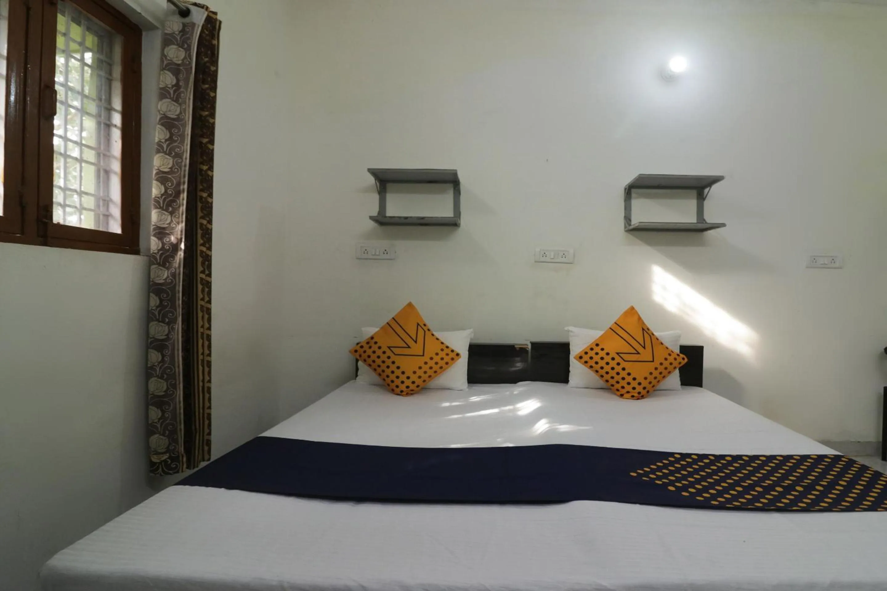 Bedroom, Bed in SPOT ON Sneha Home Stay