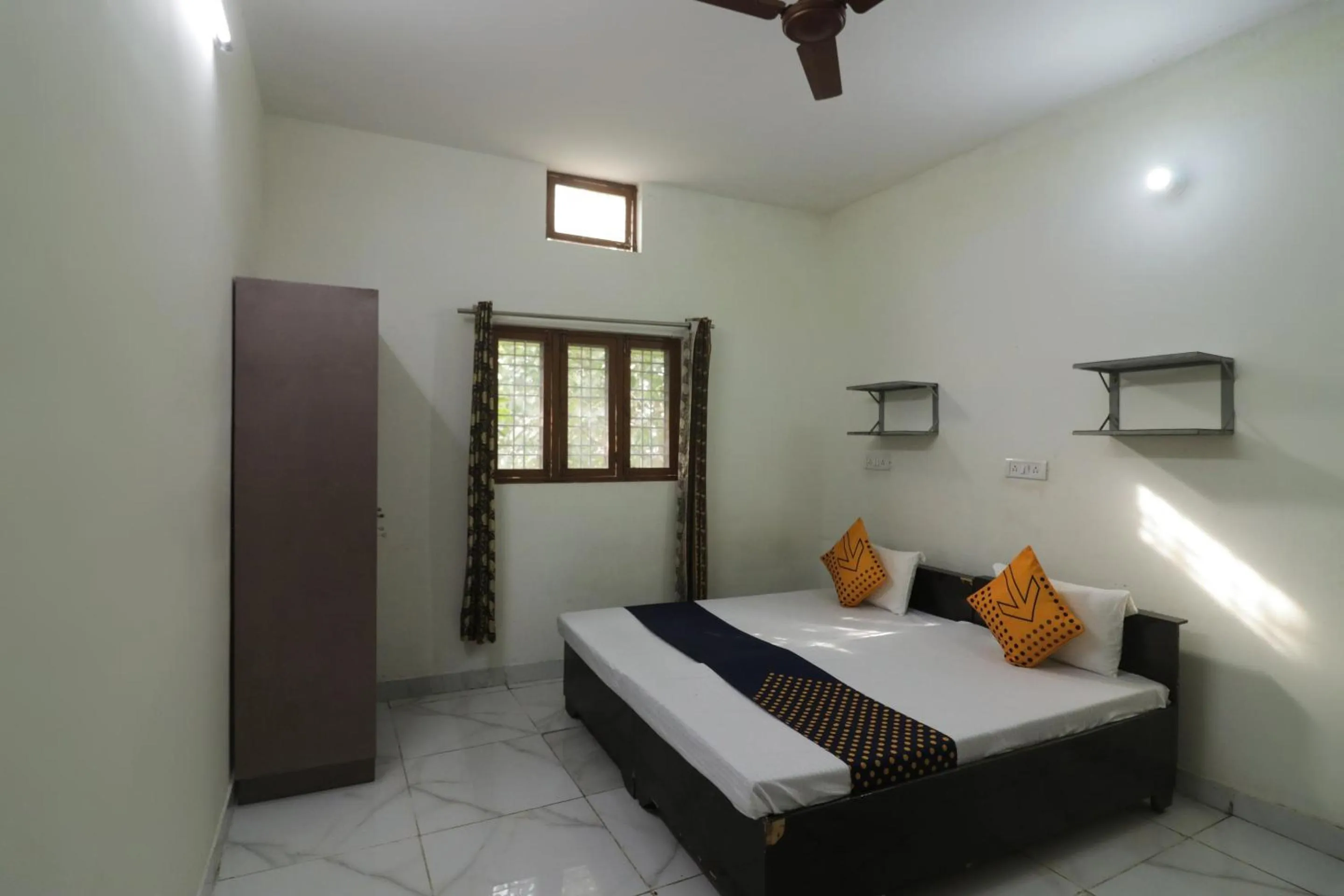 Bedroom, Bed in SPOT ON Sneha Home Stay
