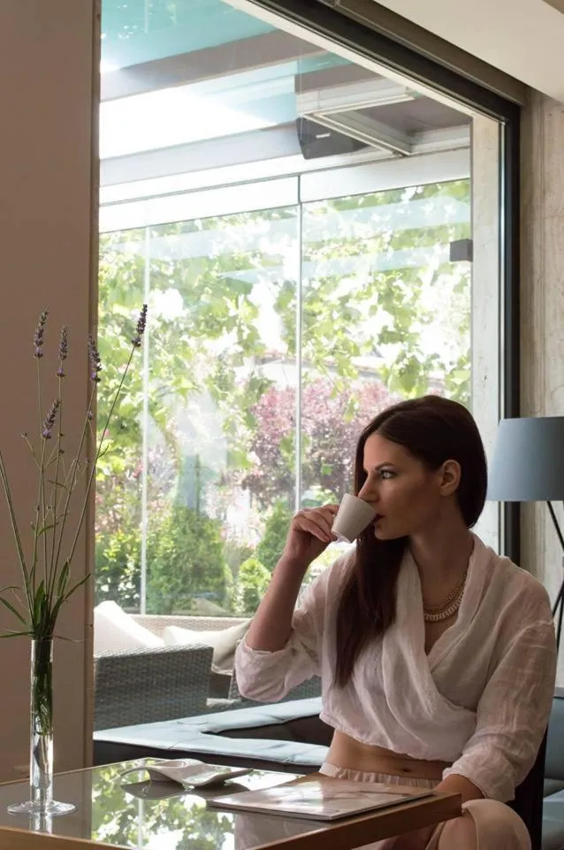 Communal lounge/ TV room in Alexakis Hotel & Spa