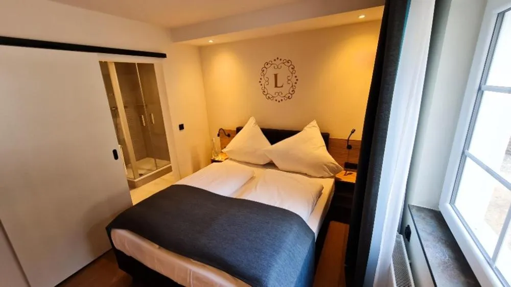 Photo of the whole room, Bed in Landgasthof zur Burg Grenzau