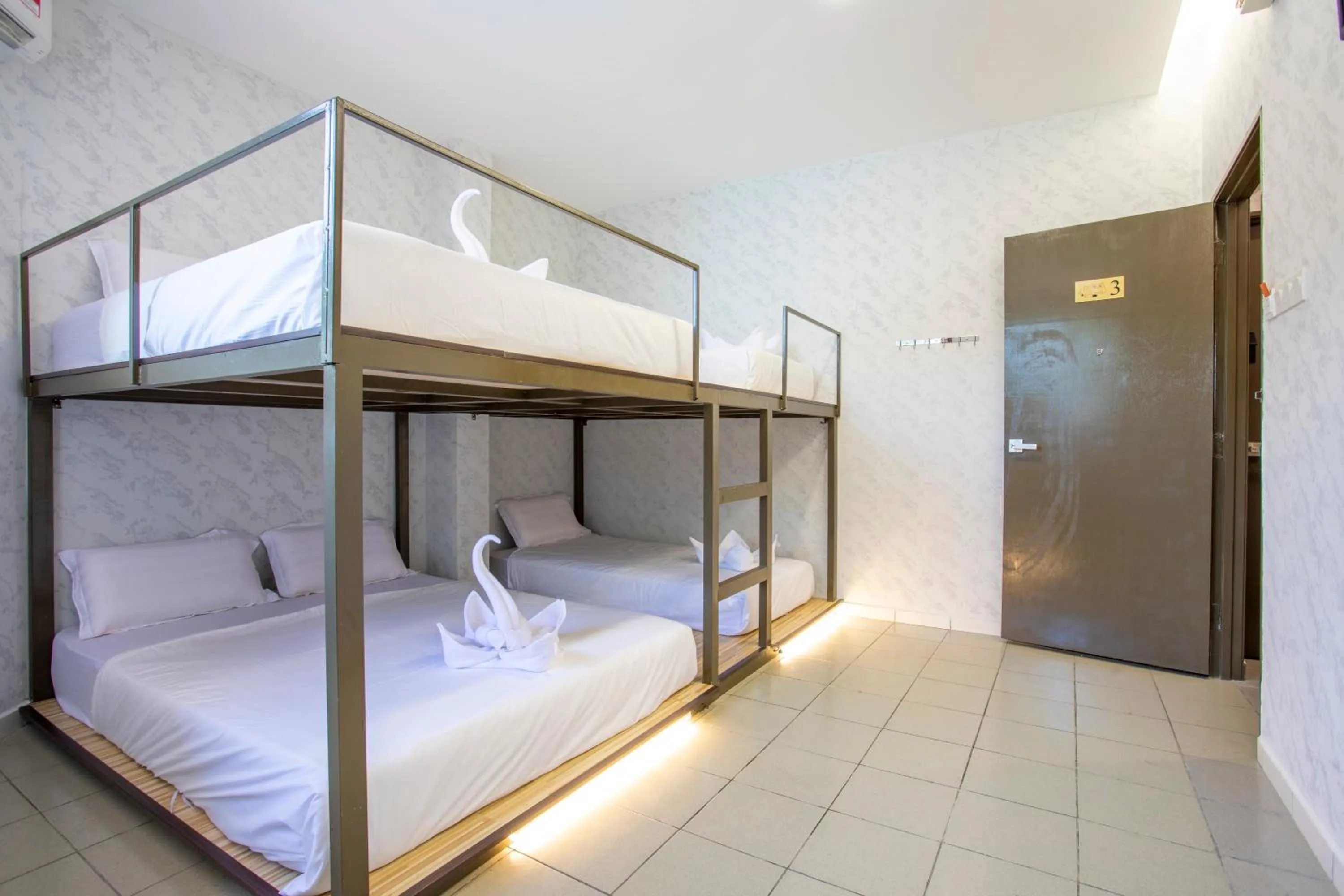 Bed in Lazy Cat Home At Gaya Street