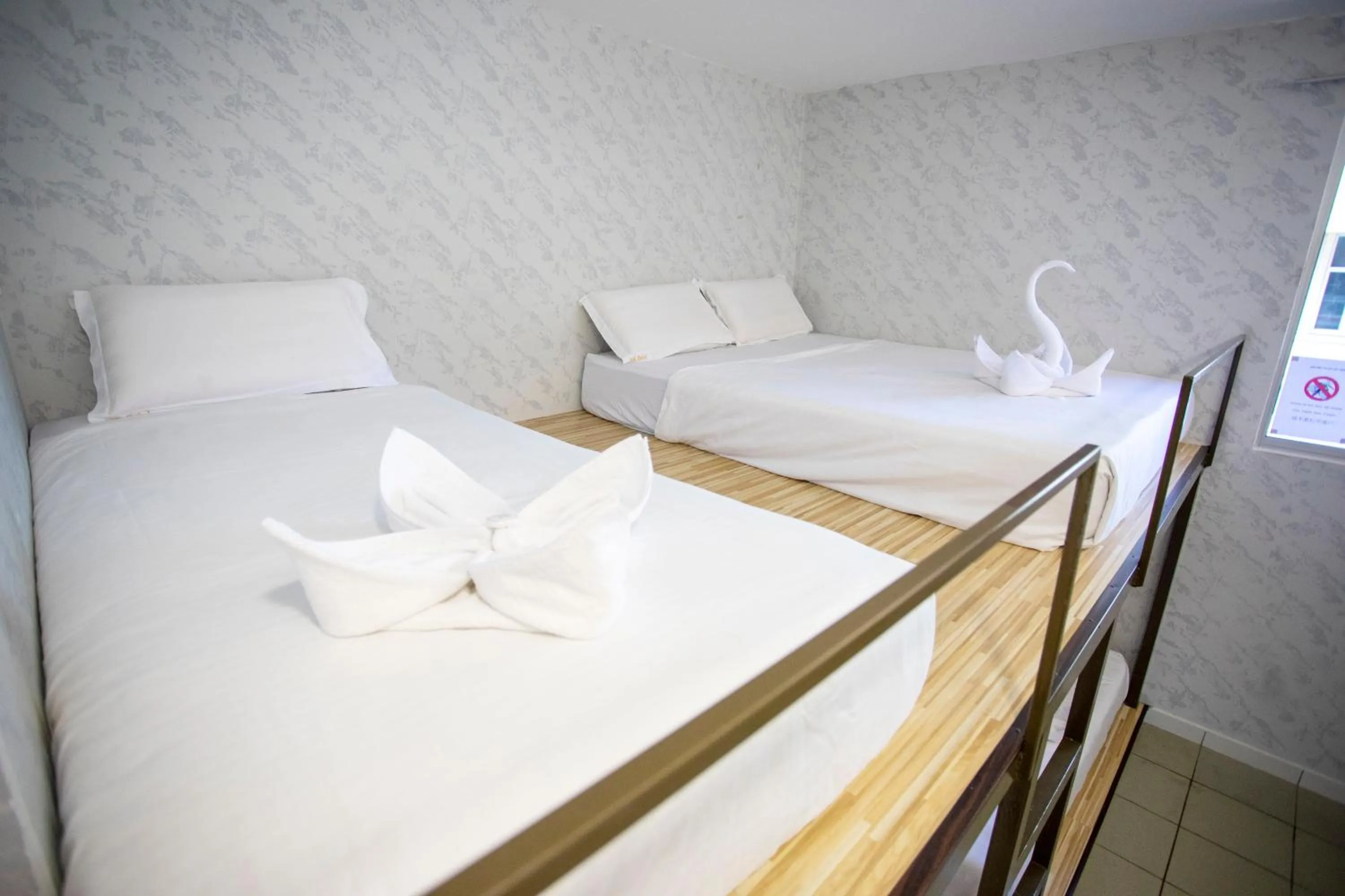 Bed in Lazy Cat Home At Gaya Street