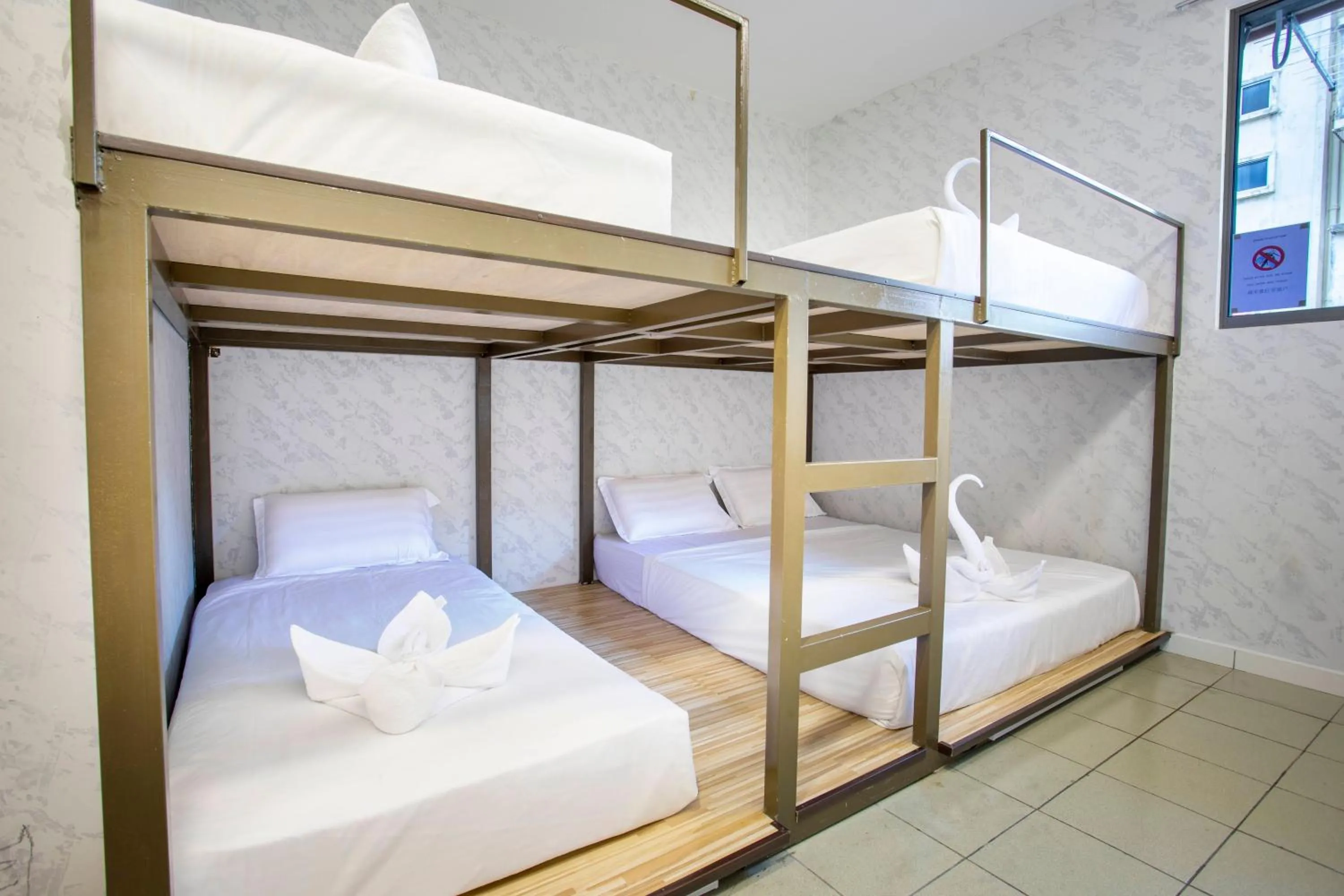 Bed in Lazy Cat Home At Gaya Street