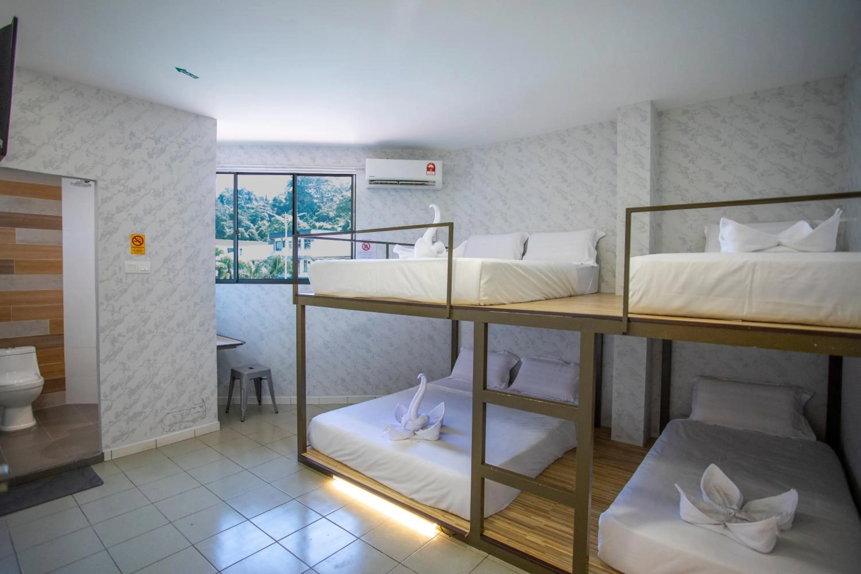 Bed in Lazy Cat Home At Gaya Street