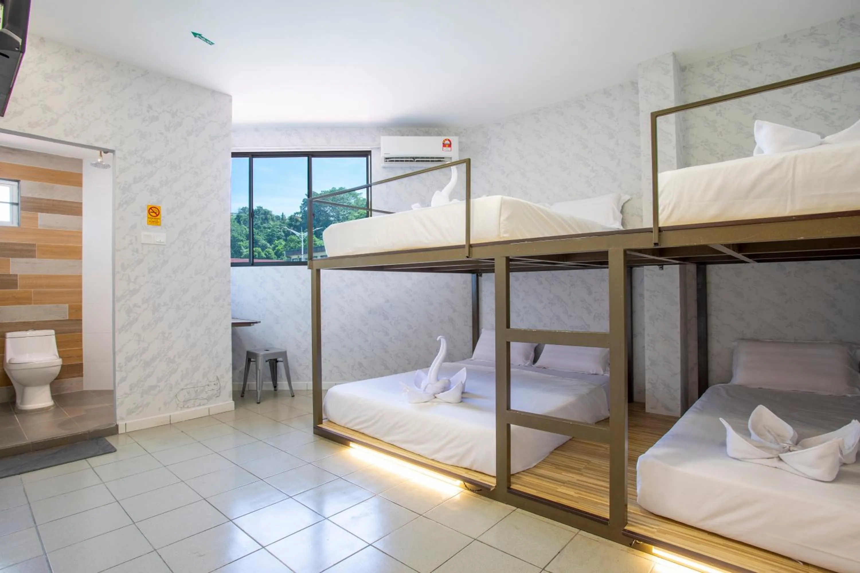 Bed in Lazy Cat Home At Gaya Street