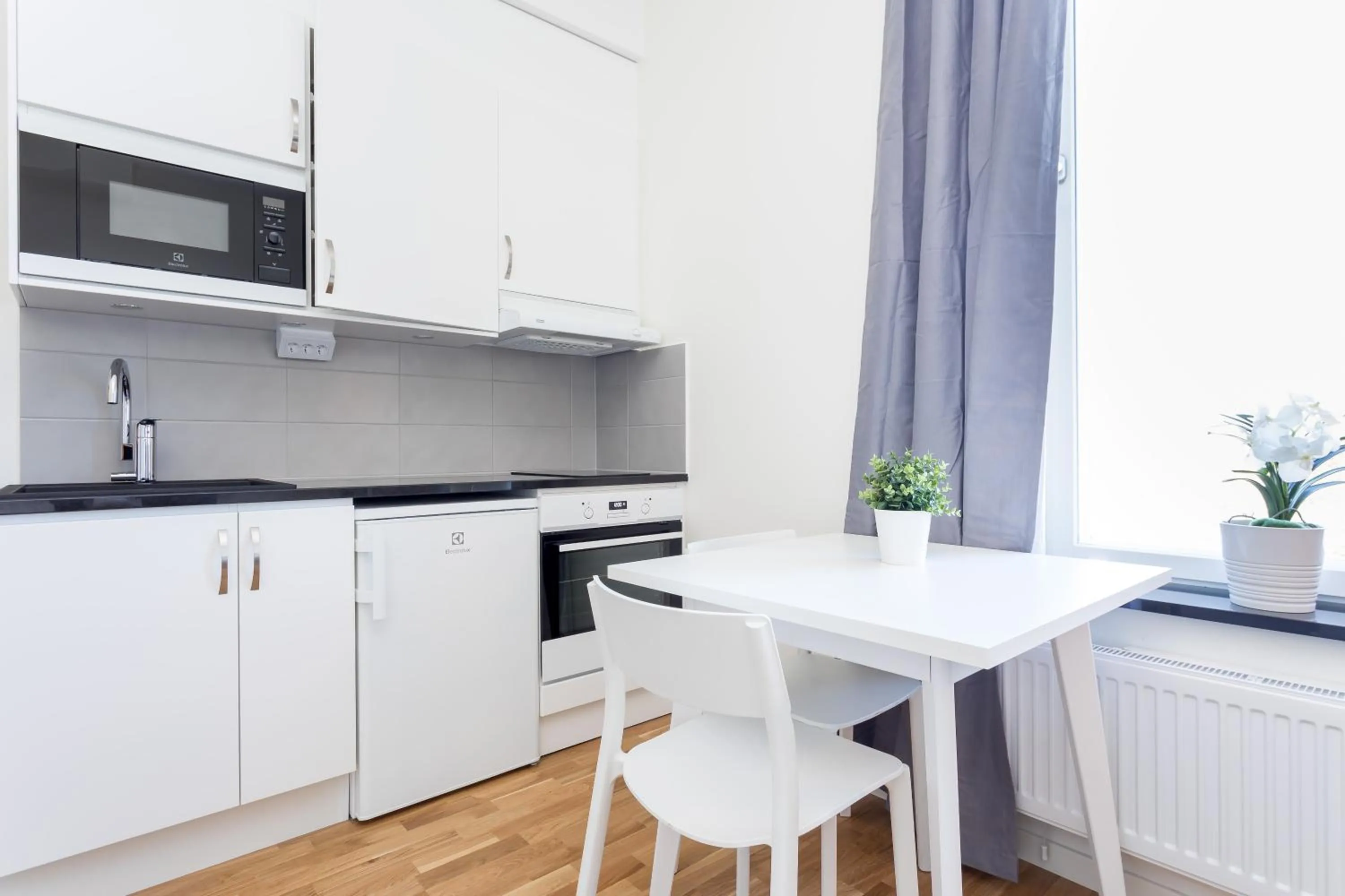 Kitchen or kitchenette in ApartDirect Linköping Vasastaden
